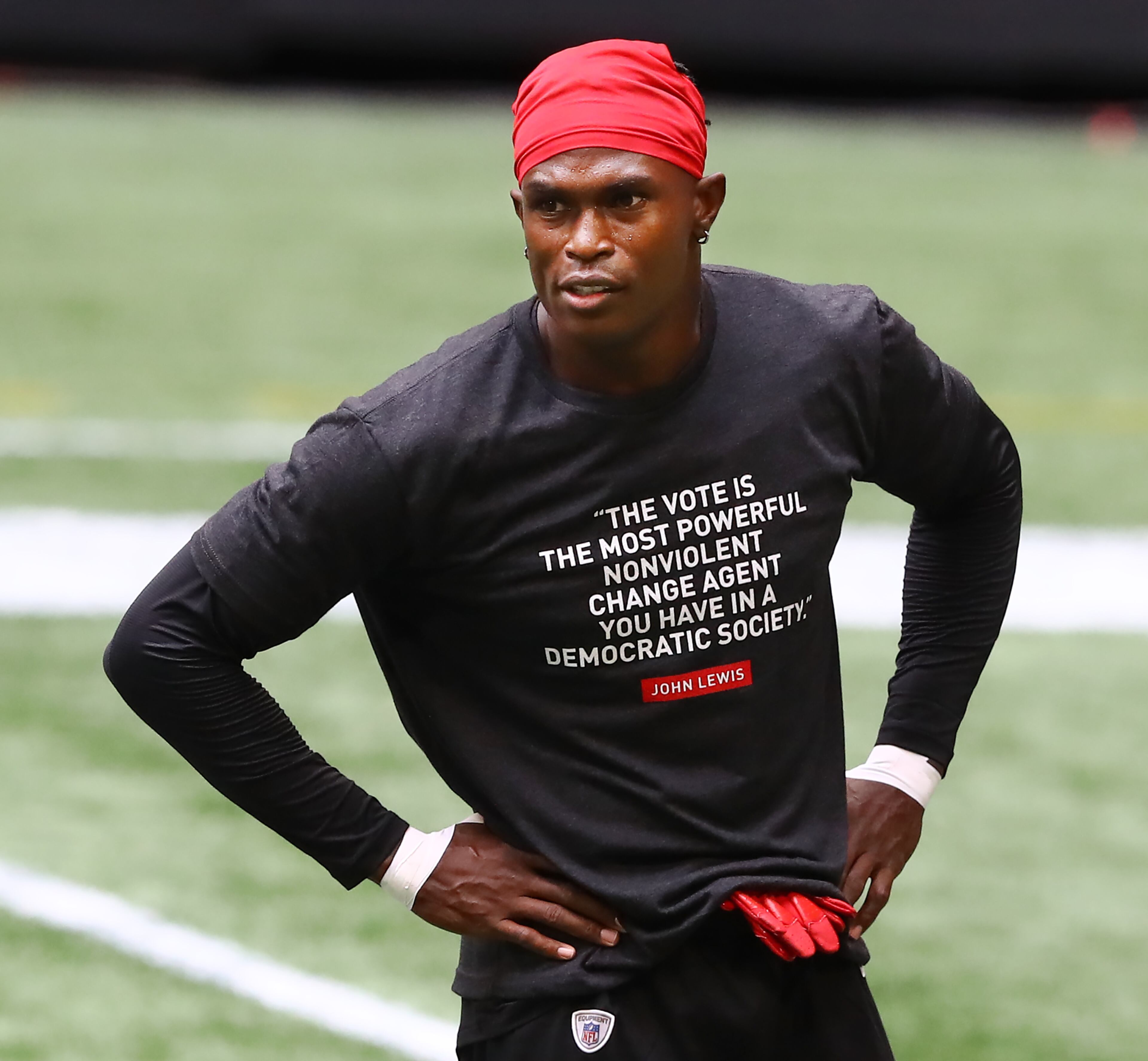 Falcons wide receiver Julio Jones wears a shirt in honor of John Lewis while preparing to play the Seattle Seahawks Sunday, Sept. 13, 2020, in Atlanta. Together, the Falcons and Seahawks will celebrate and honor the life of the late Congressman by wearing white armbands featuring his initials and logos of each team. (Curtis Compton/Curtis.Compton@ajc.com)