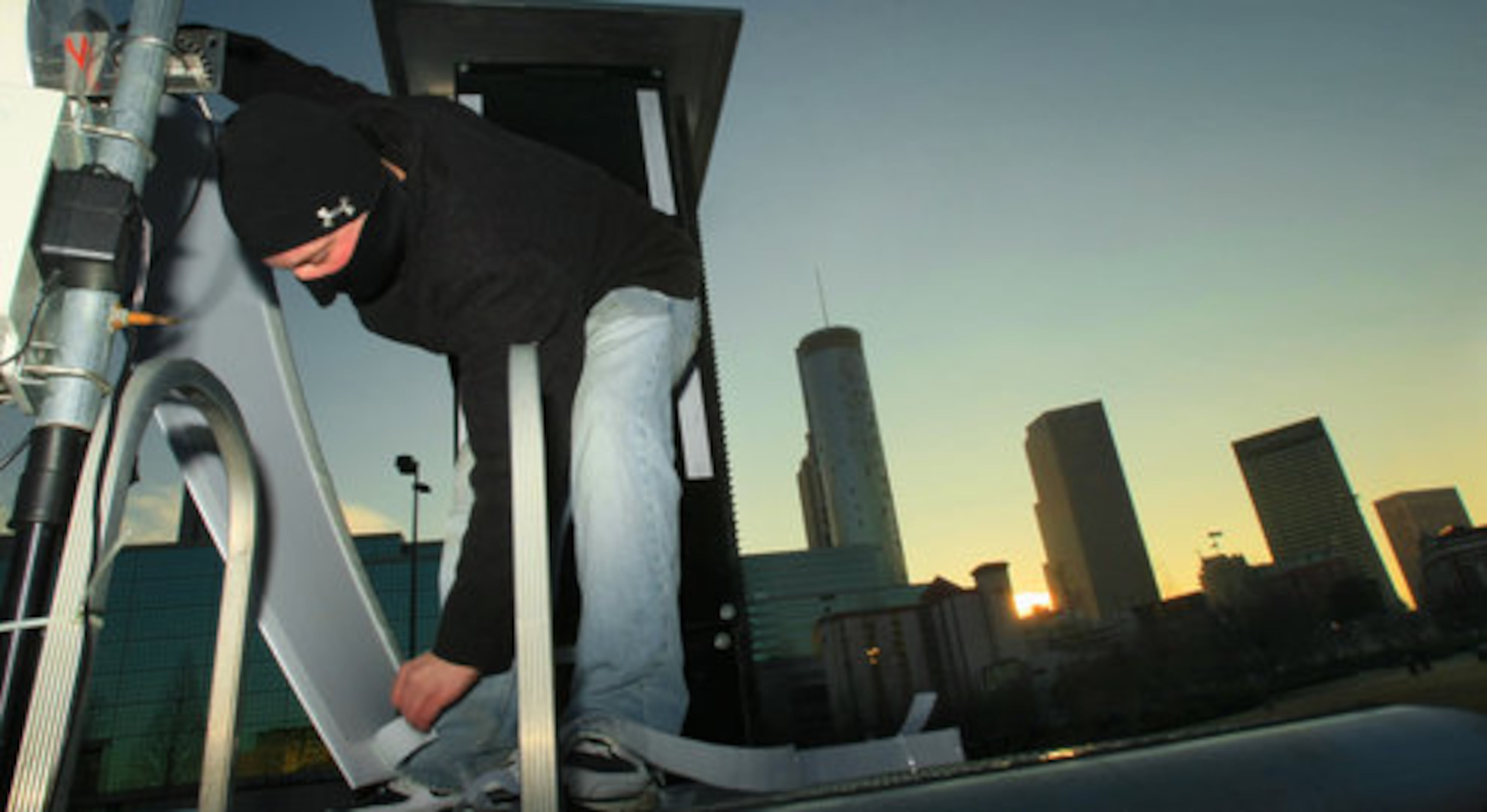 Jason Detwiler, with Upstage video, prepares one of two 9 foot by 12 foot screens that will show the Obama inauguration at Centennial Olympic Park in downtown Atlanta. A larger screen will also be available for viewing.