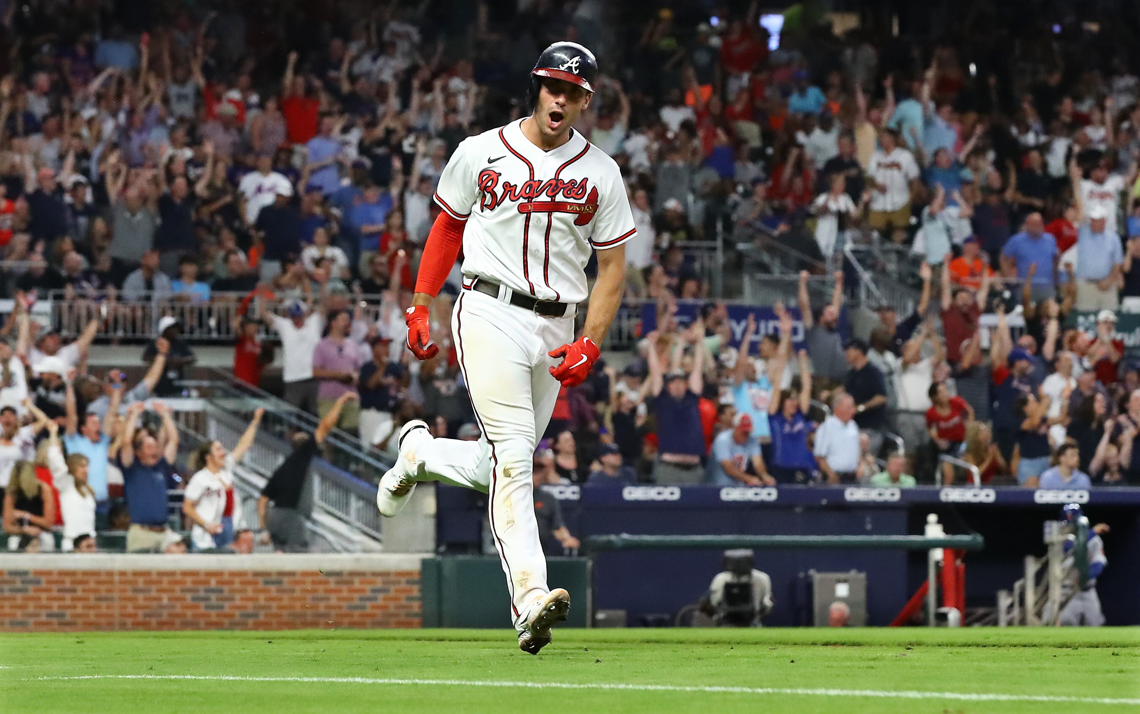 Braves first baseman Matt Olson and the fans react to his 2-run homer to take a 2-1 lead over the New York Mets during the sixth inning in a MLB baseball game on Tuesday, July 12, 2022, in Atlanta. The Braves won 4-1. “Curtis Compton / Curtis Compton@ajc.com”