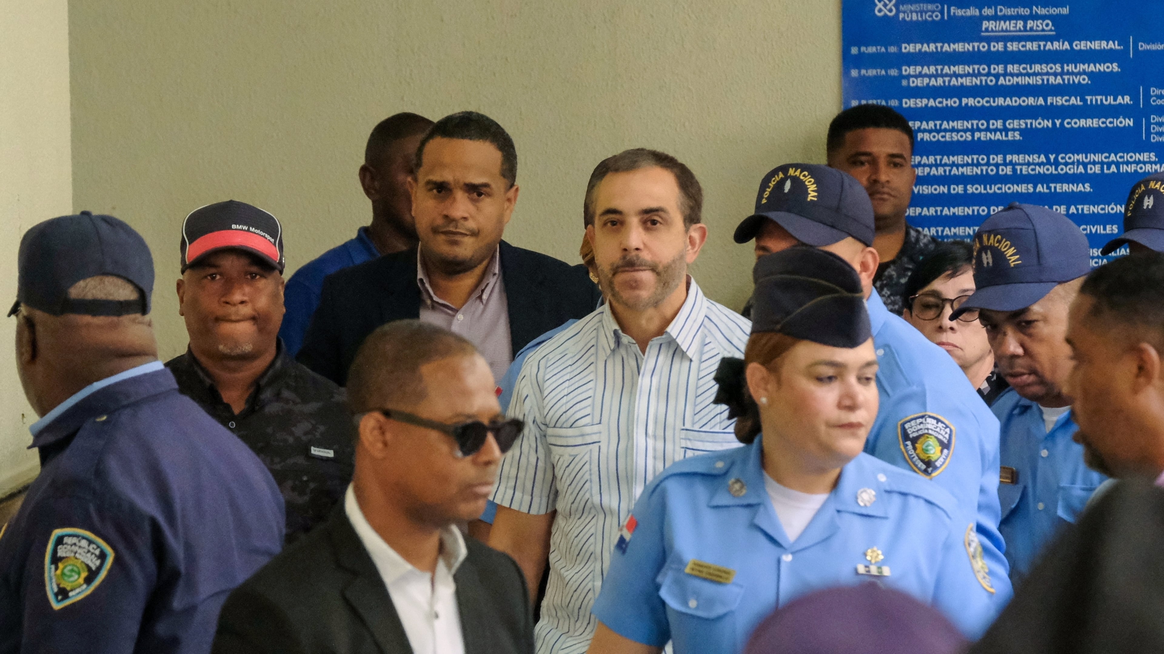 FILE - Antonio Espaillat, center, the owner of the Jet Set nightclub, whose roof collapse in 2025 resulted in fatalities, arrives at court for trial in Santo Domingo, Dominican Republic, April 27, 2026. (AP Photo/Ricardo Hernandez, File)