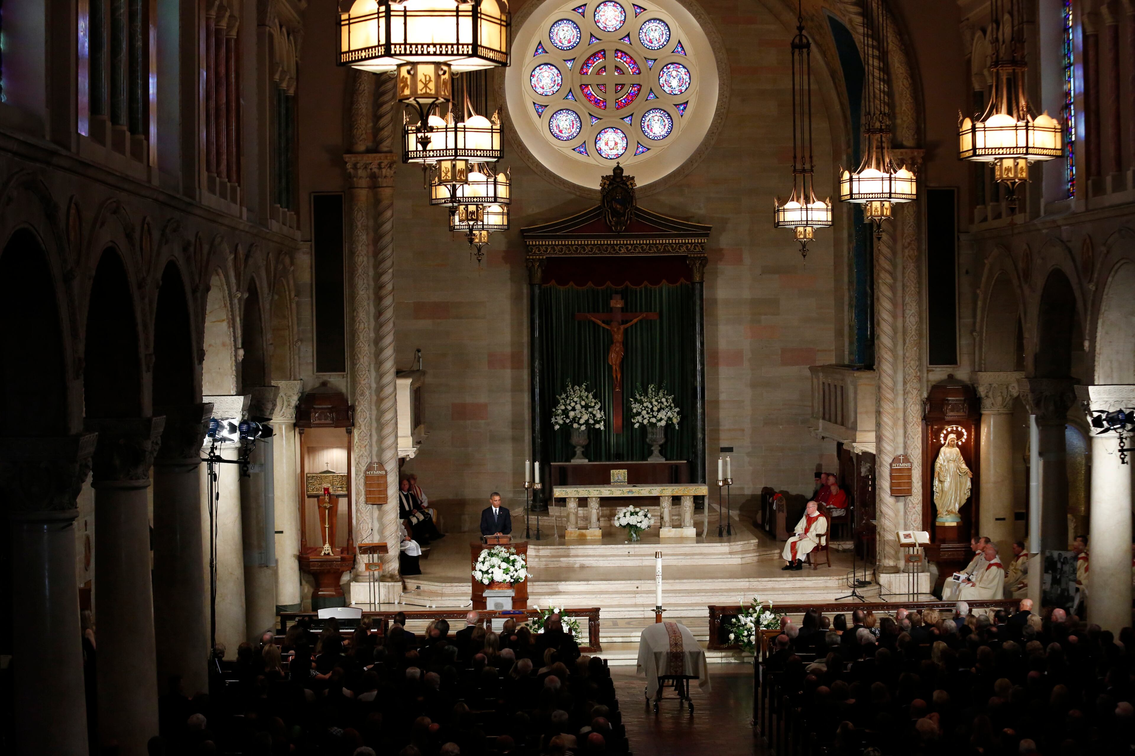 President Barack Obama delivers the eulogy in honor of former Delaware Attorney General Beau Biden, Saturday, June 6, 2015, at St. Anthony of Padua Church in Wilmington, Del. Biden, Vice President Joe Biden's eldest son, died at the age of 46 after a battle with brain cancer. (Yuri Gripas/Pool Photo via AP)