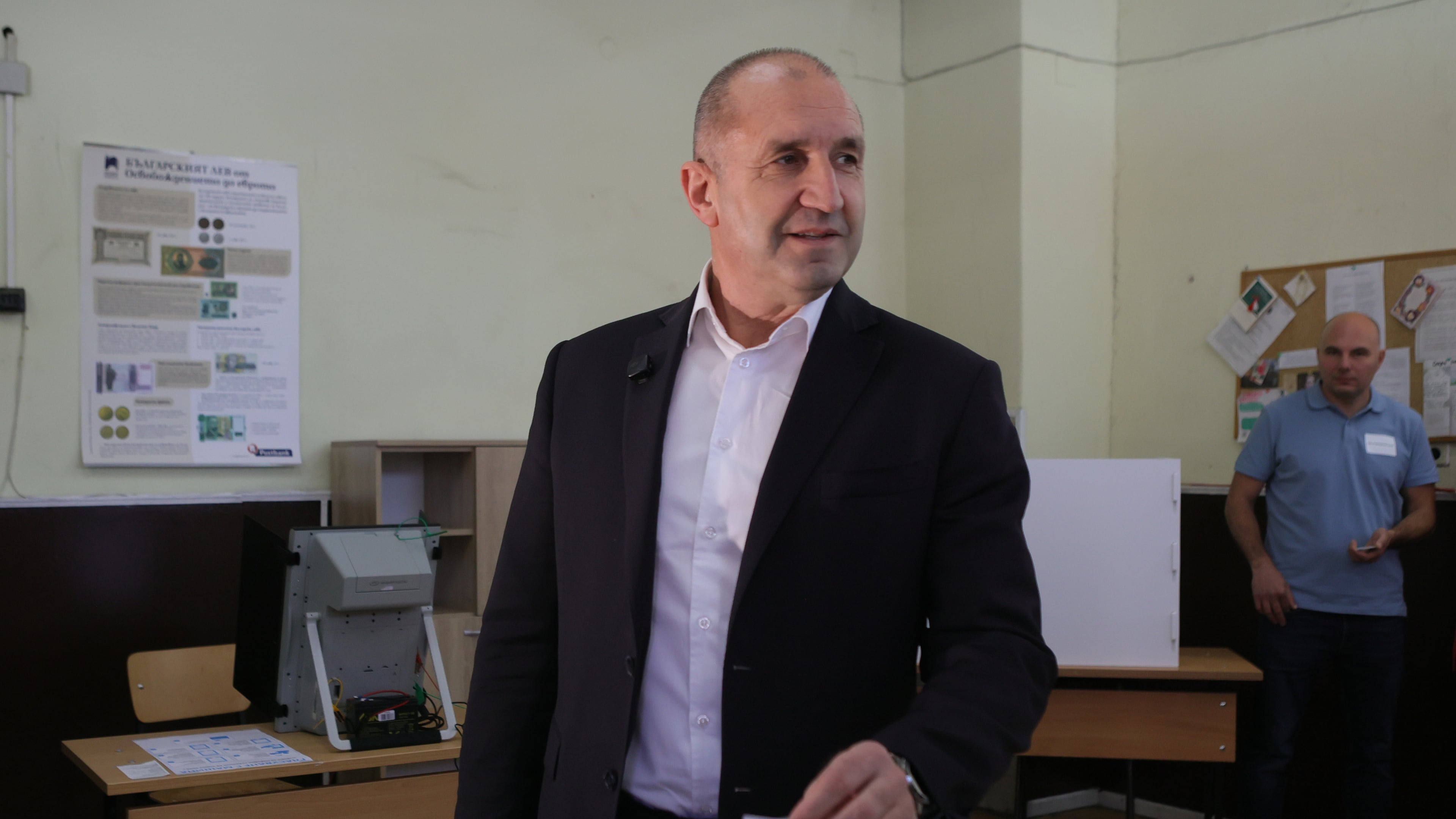 Former Bulgarian President Rumen Radev casts his vote at a polling station in Sofia, Bulgaria, Sunday, April 19, 2026, during early parliamentary elections. (AP Photo/Valentina Petrova)