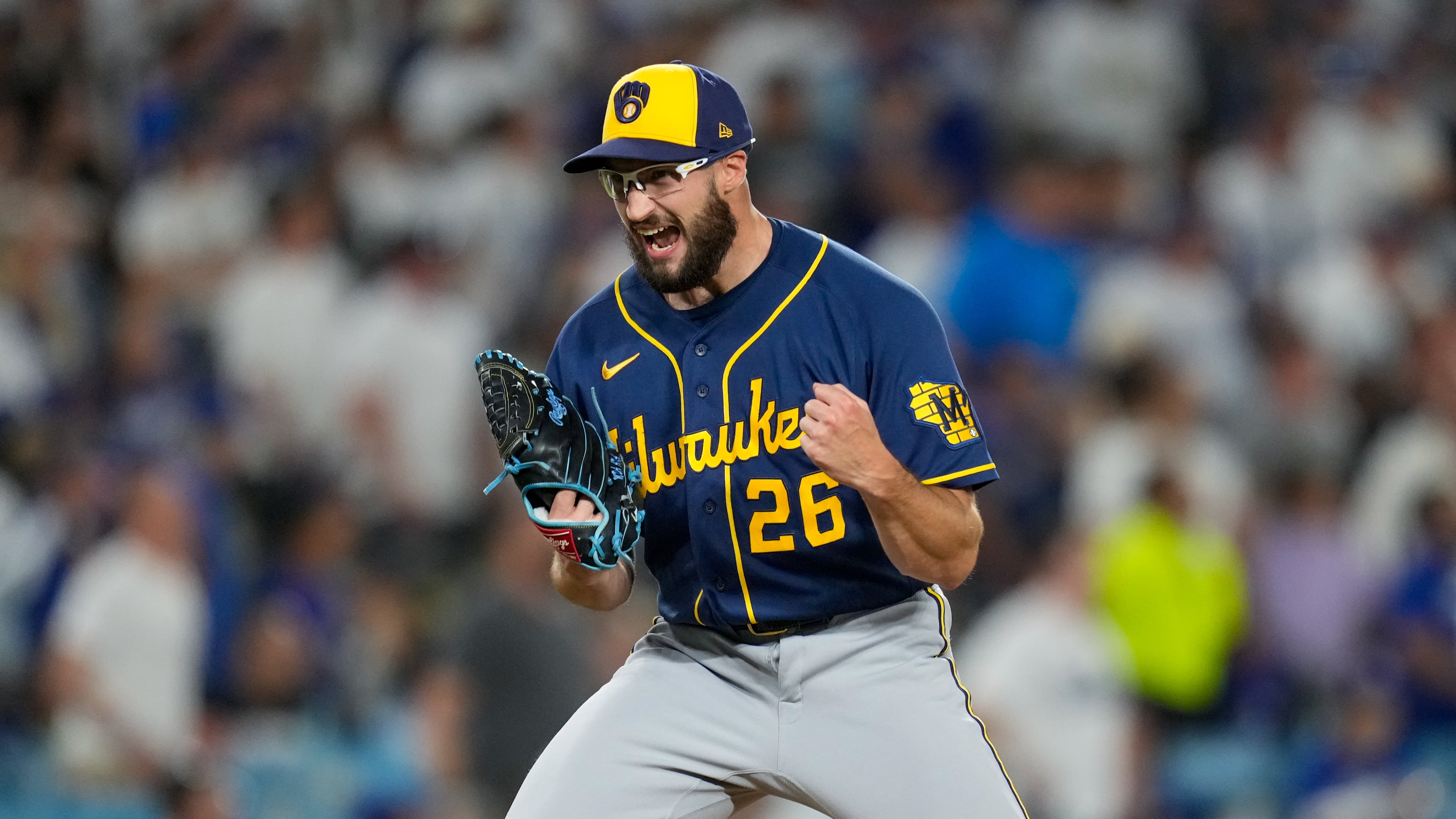 Milwaukee Brewers pitcher Aaron Ashby celebrates the final out of Game 4 of baseball's National League Championship Series between the Milwaukee Brewers and the Los Angeles Dodgers, Thursday, Oct. 15, 2026, in Los Angeles. (AP Photo/Ashley Landis)