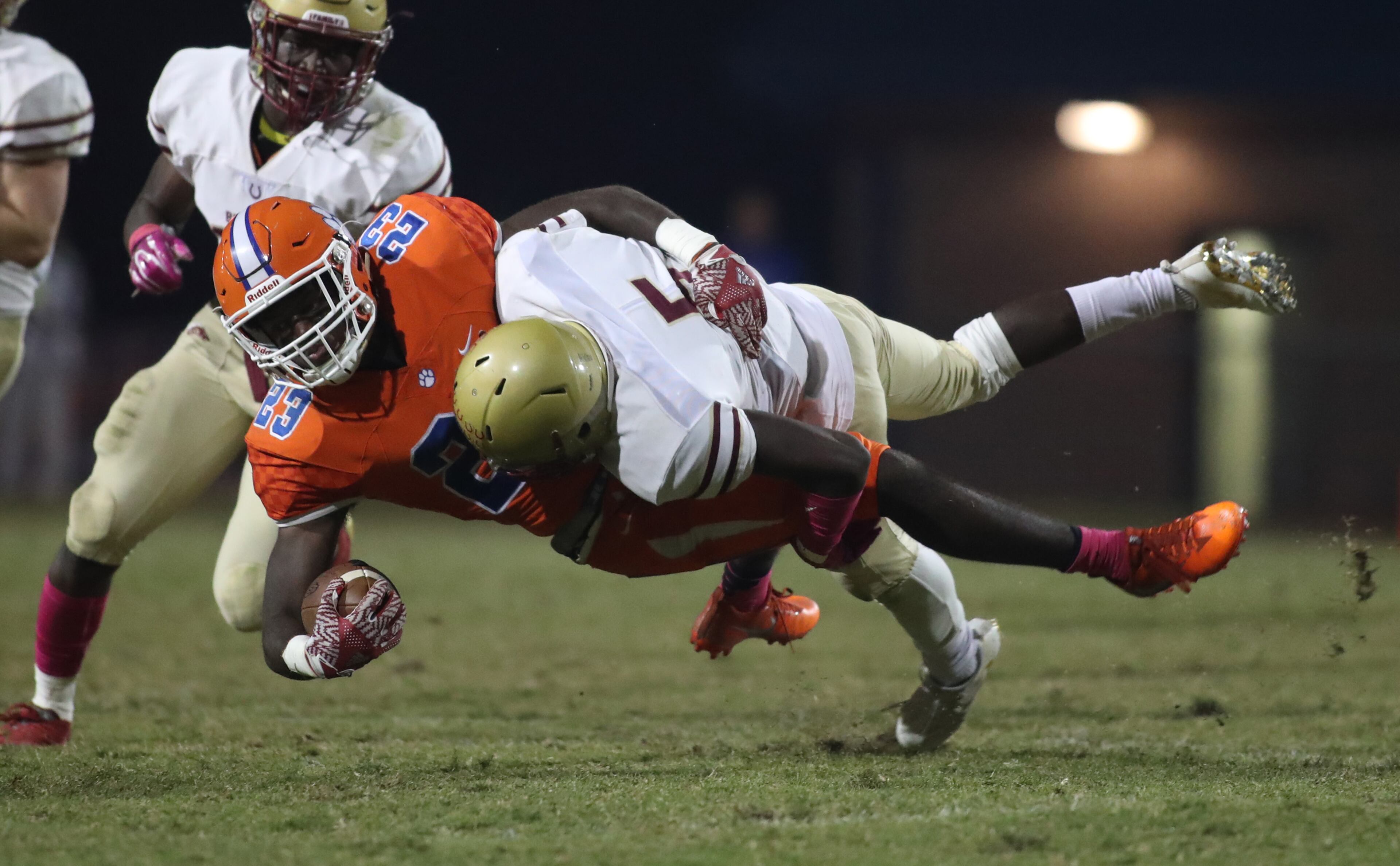 October 20, 2017 - Lilburn, Ga: Brookwood defensive back Caleb Riley (5) tackles Parkview wide receiver Miles Marshall (23) after Marshall made a catch in the second half of their game at Parkview High School Friday, October 20, 2017, in Lilburn, Ga.. Brookwood won 30-27. PHOTO / JASON GETZ