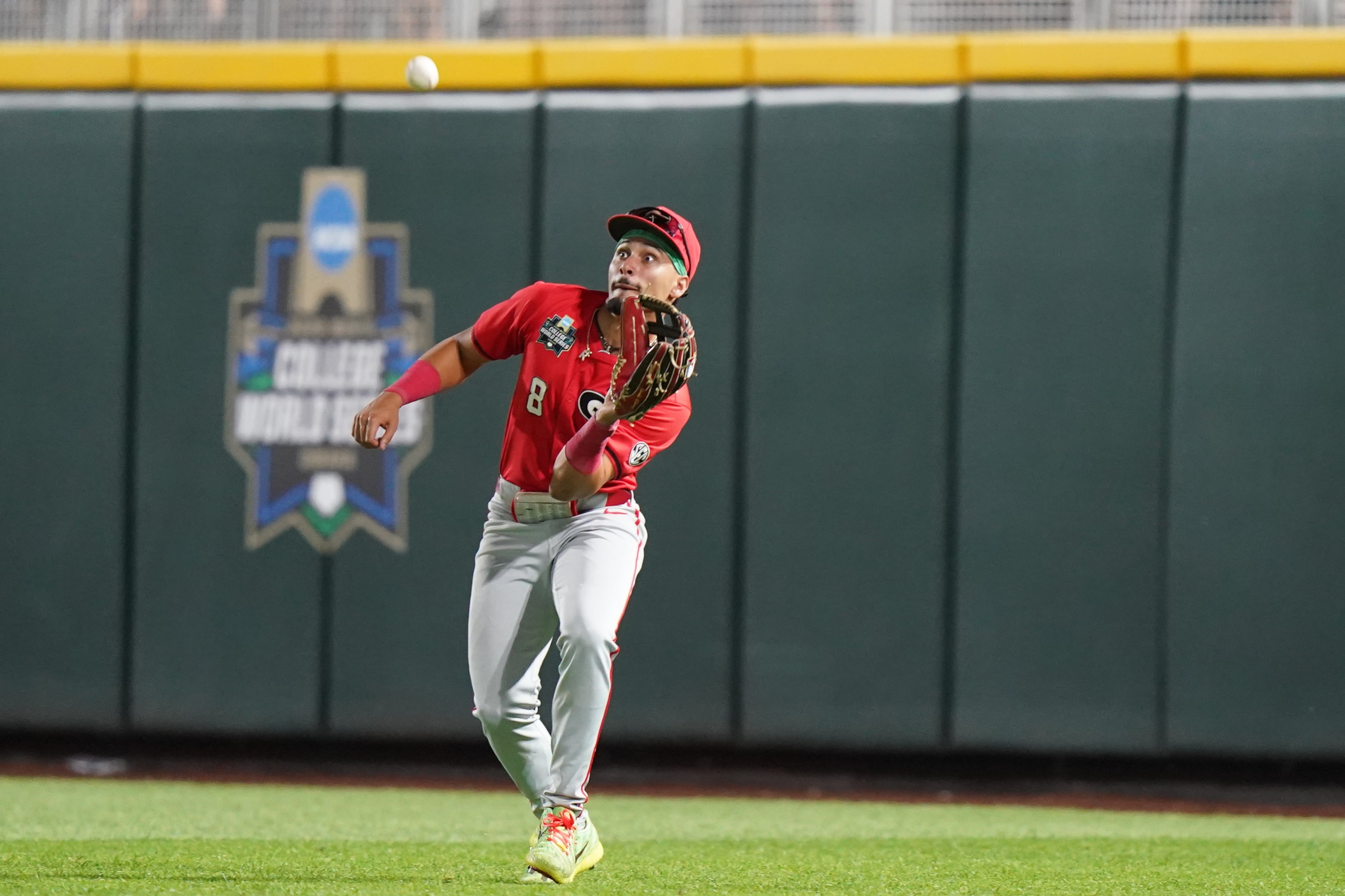 Georgia infielder Rylan Lujo (8) catches the ball for an out in the ninth inning during an NCAA baseball College World Series elimination game against Texas, Tuesday, June 16, 2026 in Omaha, Neb. Georgia won 2-0. (AP Photo/Vera Nieuwenhuis)