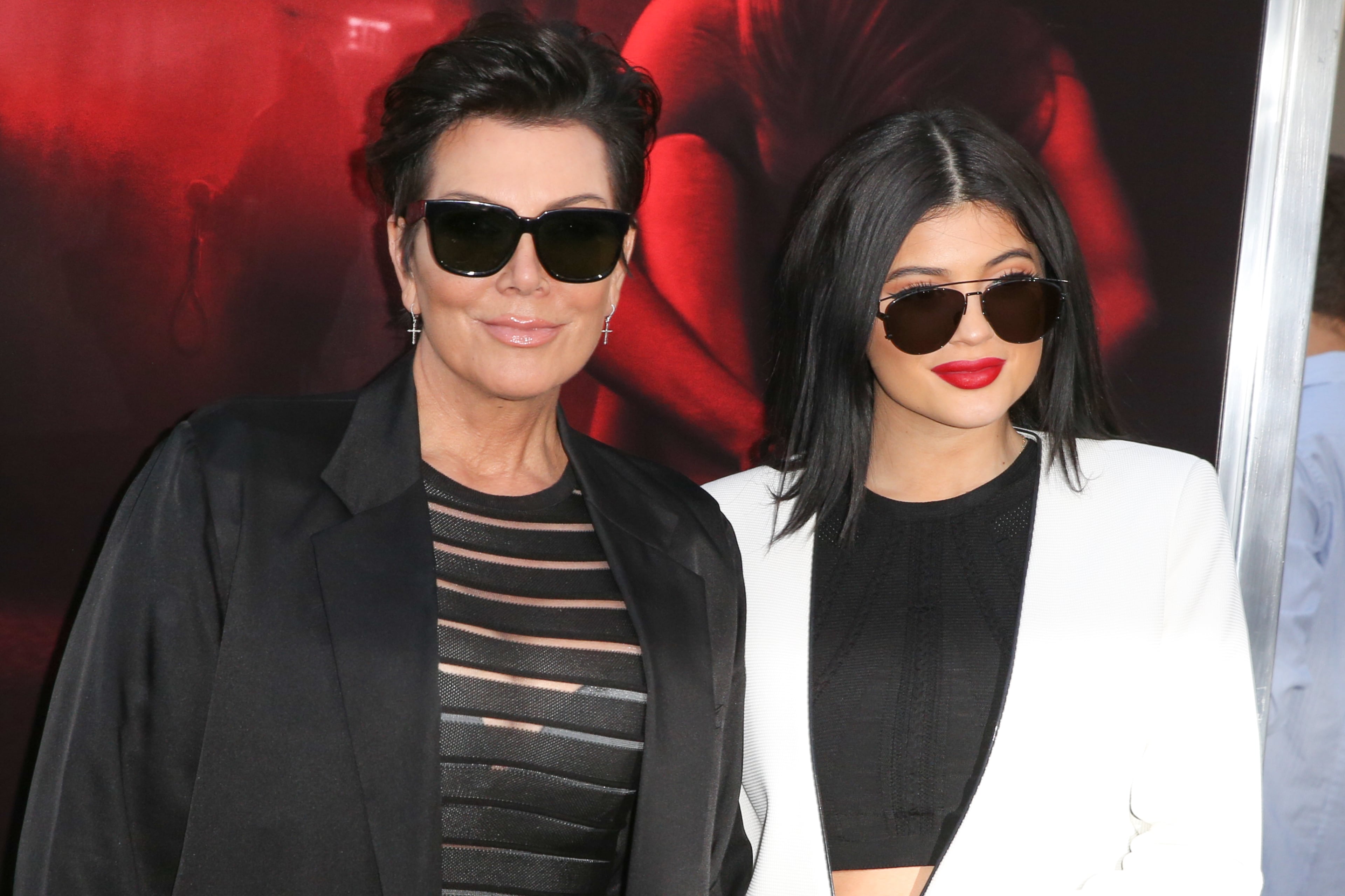 Kris Jenner, left, and Kylie Jenner arrive at the LA Premiere of "The Gallows" at Hollywood High School on Tuesday, July 7, 2015, in Los Angeles. (Photo by Rich Fury/Invision/AP)