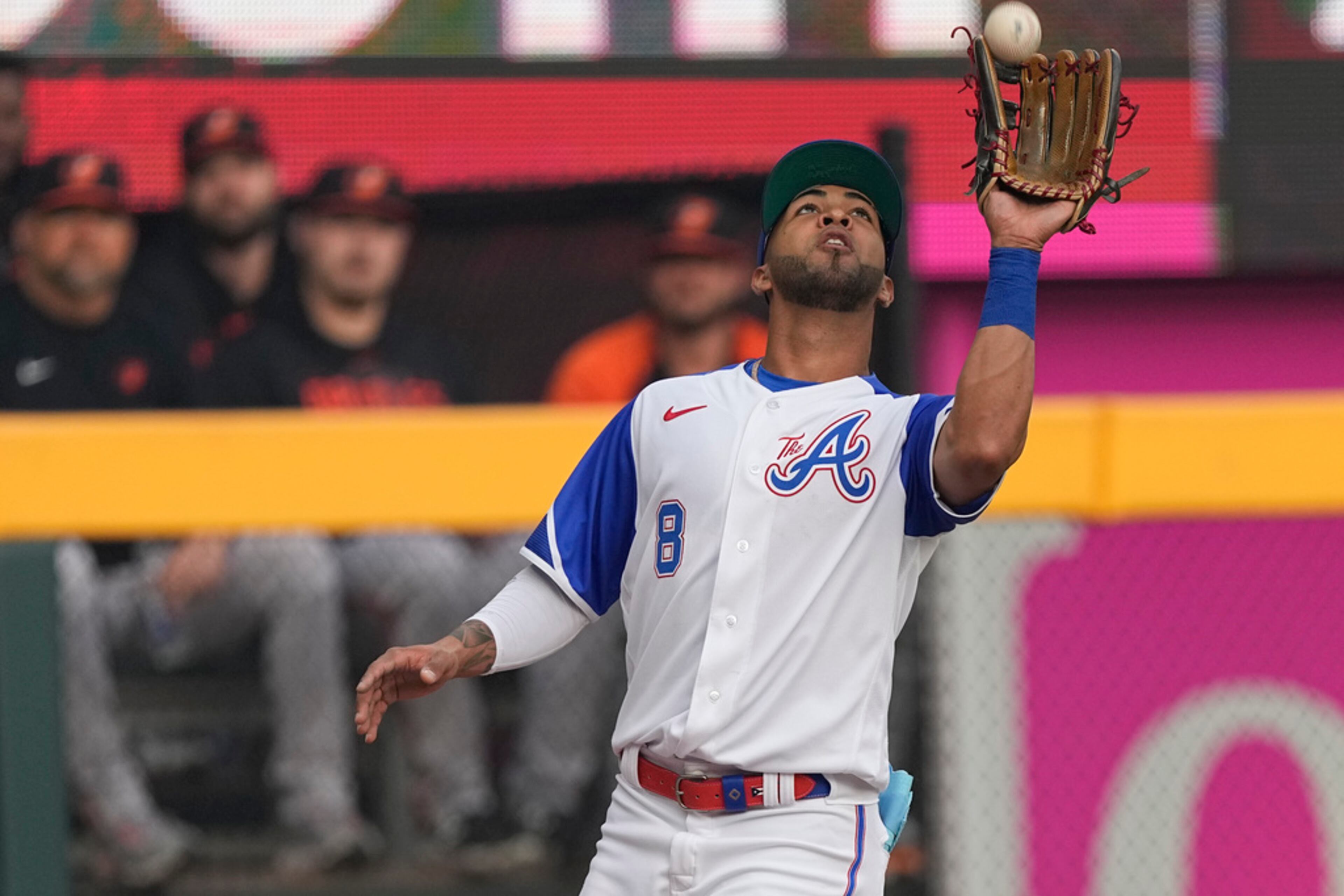 Atlanta Braves left fielder Eddie Rosario makes a catch to retire Baltimore Orioles' Gunnar Henderson in the second inning of a baseball game Saturday, May 6, 2023, in Atlanta. (AP Photo/John Bazemore)