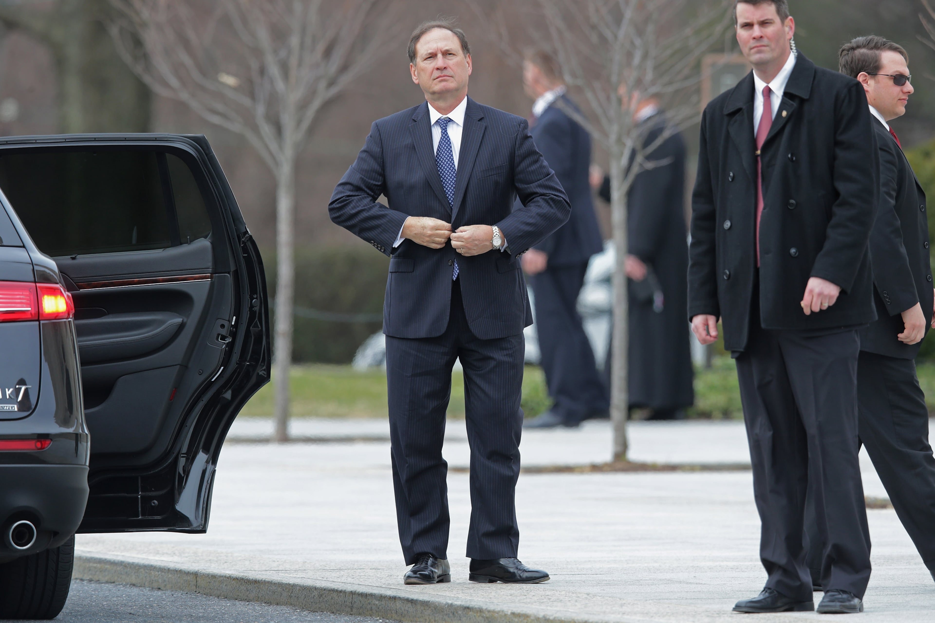 WASHINGTON, DC - FEBRUARY 20: U.S. Supreme Court Associate Justice Samuel Alito (C) arrives for the funeral of fellow Associate Justice Antonin Scalia at the the Basilica of the National Shrine of the Immaculate Conception February 20, 2016 in Washington, DC. Scalia, who died February 13 while on a hunting trip in Texas, layed in repose in the Great Hall of the Supreme Court on Friday and his funeral service will be at the basillica today. (Photo by Chip Somodevilla/Getty Images)