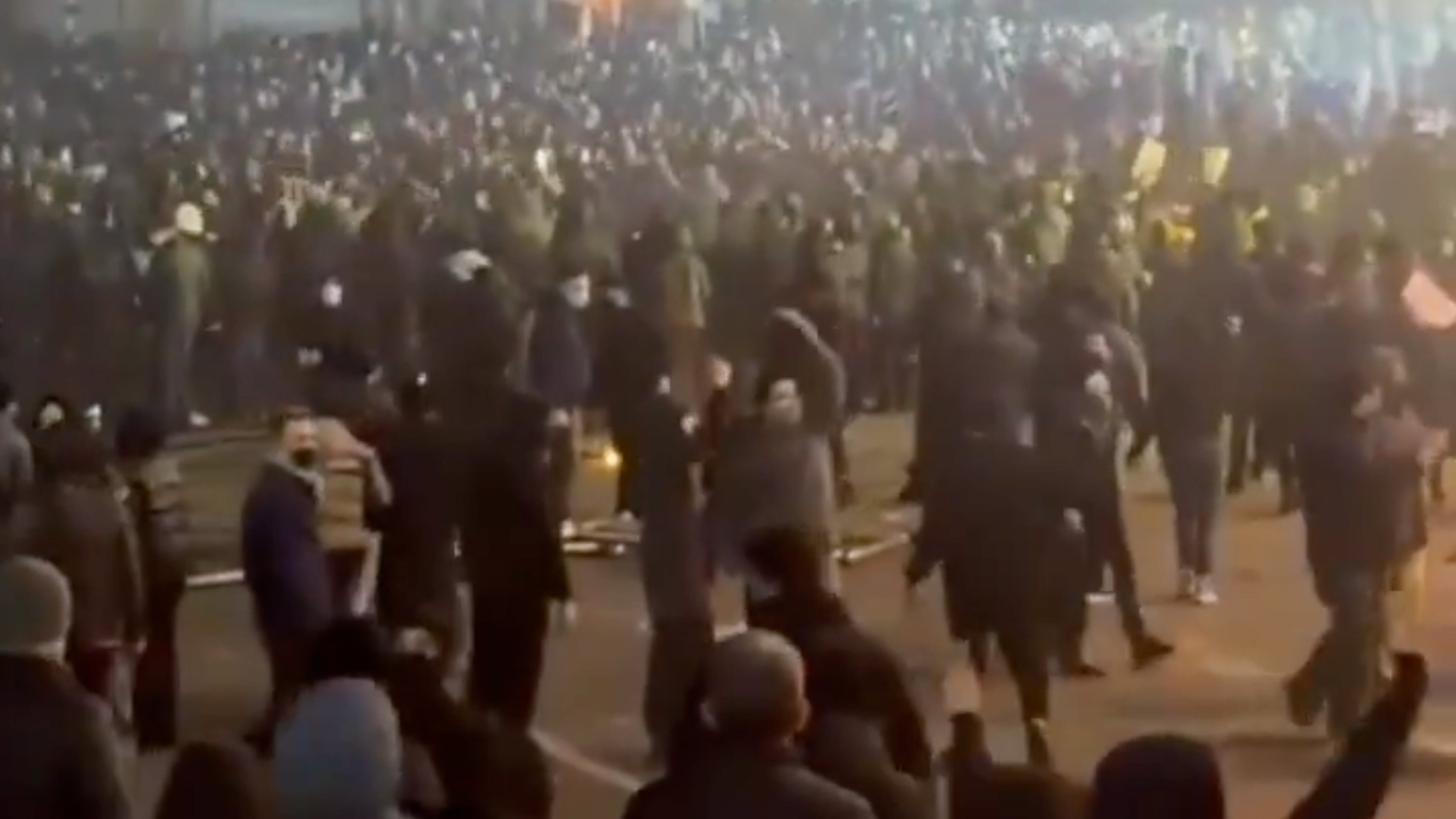 In this frame grab from video taken by an individual not employed by The Associated Press and obtained by the AP outside Iran shows people during a protest in Tehran, Iran, Friday, Jan. 9, 2026. (UGC via AP)