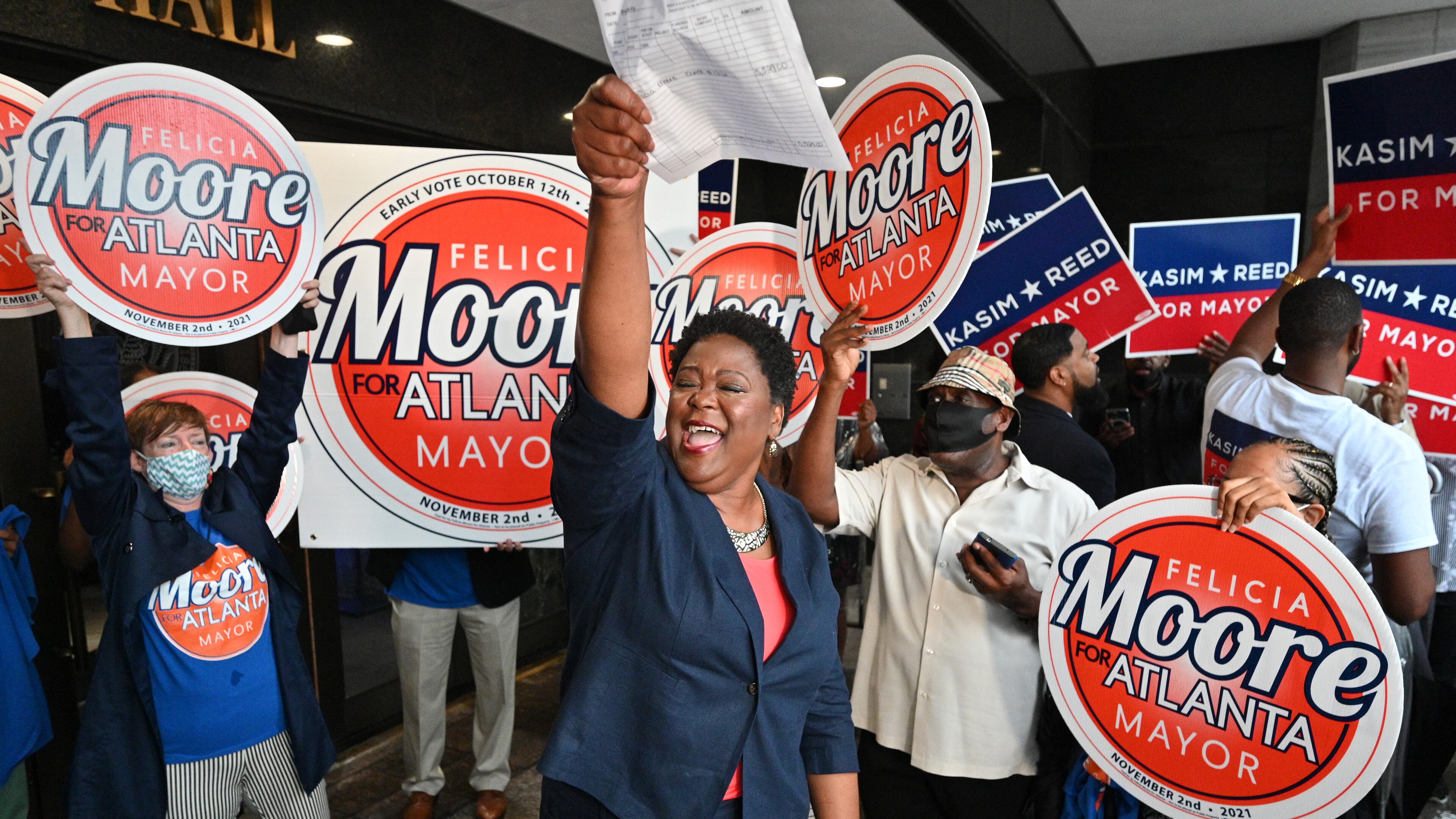 August 17, 2021 Atlanta - Atlanta City Council President Felicia Moore pumps her fist after filing paperwork for November 2nd Atlanta Mayoral Election outside the Atlanta City Hall on Tuesday, August 17, 2021. Atlanta City Council President Felicia Moore and former Atlanta mayor Kasim Reed filed paperwork and qualified as a candidate in the November 2nd Atlanta Mayoral Election. (Hyosub Shin / Hyosub.Shin@ajc.com)