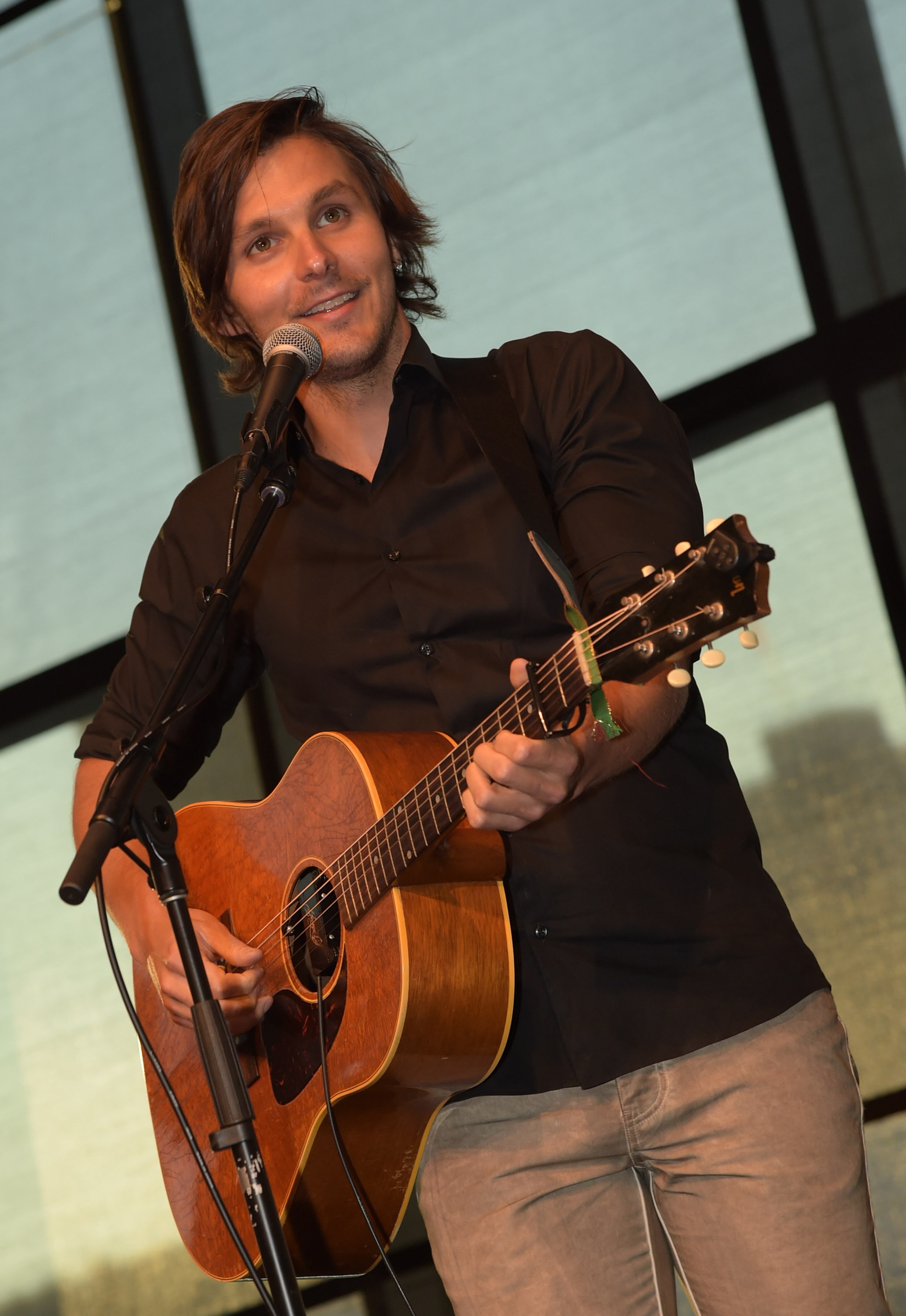 NASHVILLE, TN - AUGUST 13: Singer/Songwriter Charlie Worsham performs at the Country Music Hall of Fame Kenny Rogers Exhibit Opening Reception at the Country Music Hall of Fame and Museum on August 13, 2014 in Nashville, Tennessee. (Photo by Rick Diamond/Getty Images for the Country Music Hall of Fame and Museum)