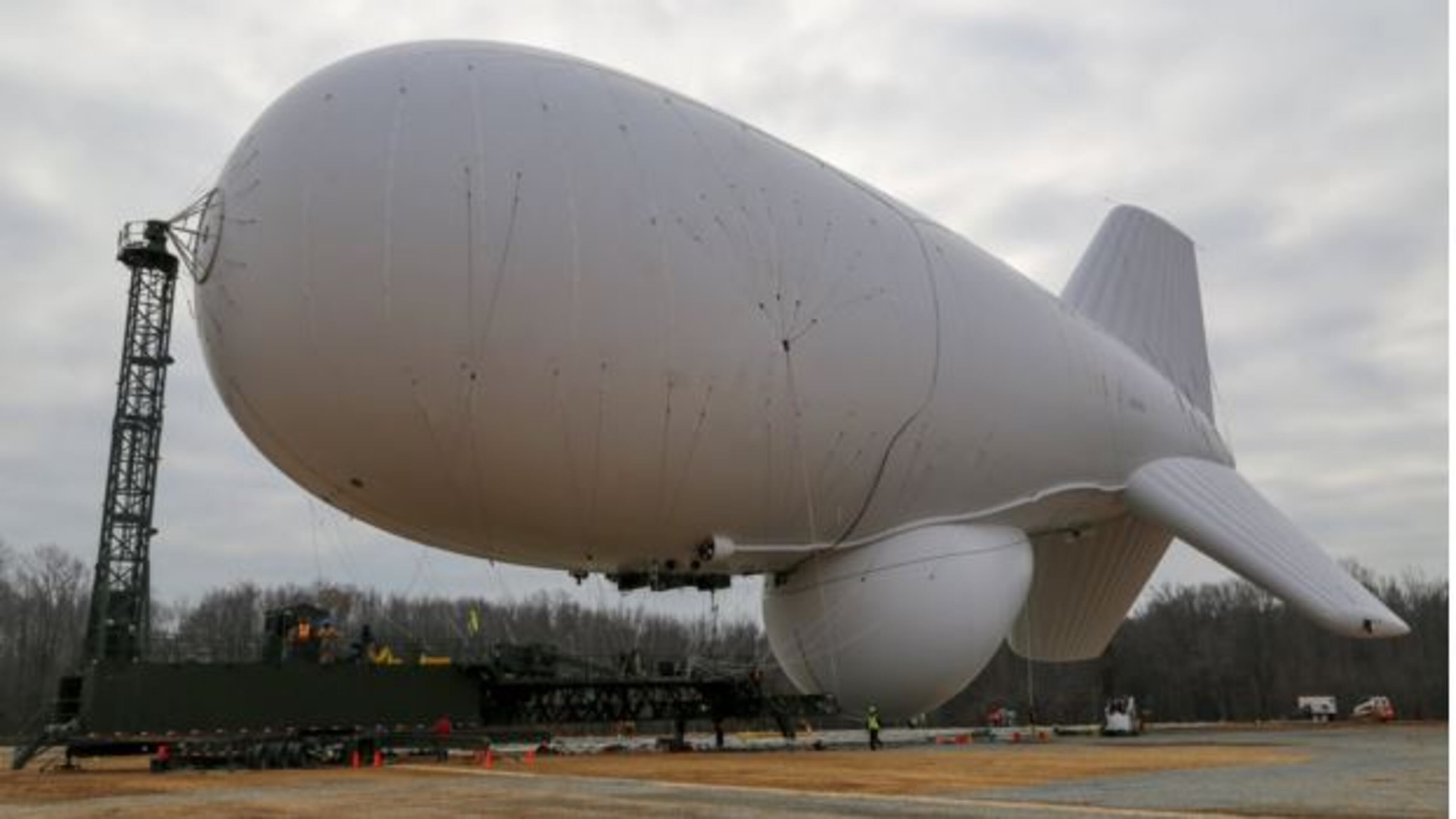 Joint Land Attack Cruise Missile Defense Elevated Netted Sensor System (JLENS) personnel oversee the inflation of an aerostat at Aberdeen Proving Ground, Md., Dec. 15, 2014. JLENSprovides national command authorities with increased situational awareness and early warning detection against possible threats. (U.S. Army Photo by Sgt. Ronald Sellinger /Released)