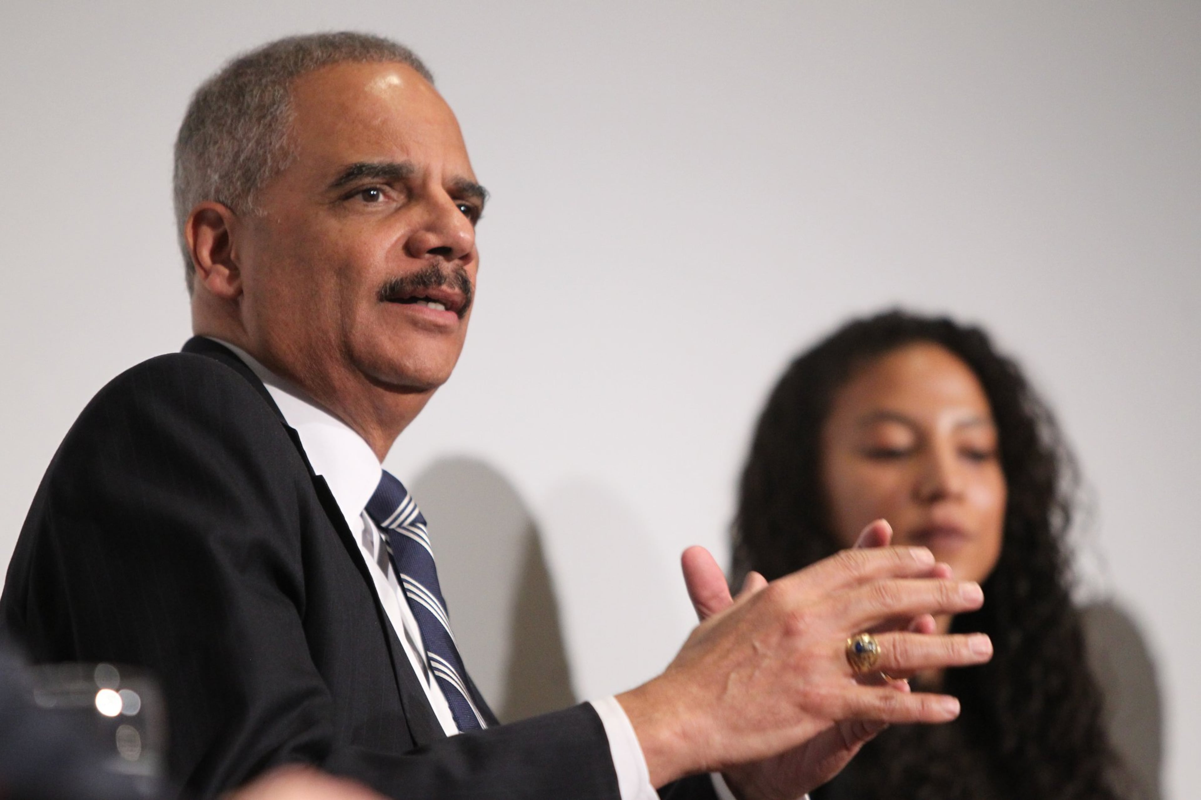 Former U.S. Attorney General Eric Holder speaks while fellow panelist Elizabeth Hinton listens in the background at the Jimmy Carter Presidential Library and Museum in Atlanta in 2017. Holder is the chairman of a Democratic political group that filed a lawsuit attempting to throw out Georgia’s congressional districts. (HENRY TAYLOR / HENRY.TAYLOR@AJC.COM)