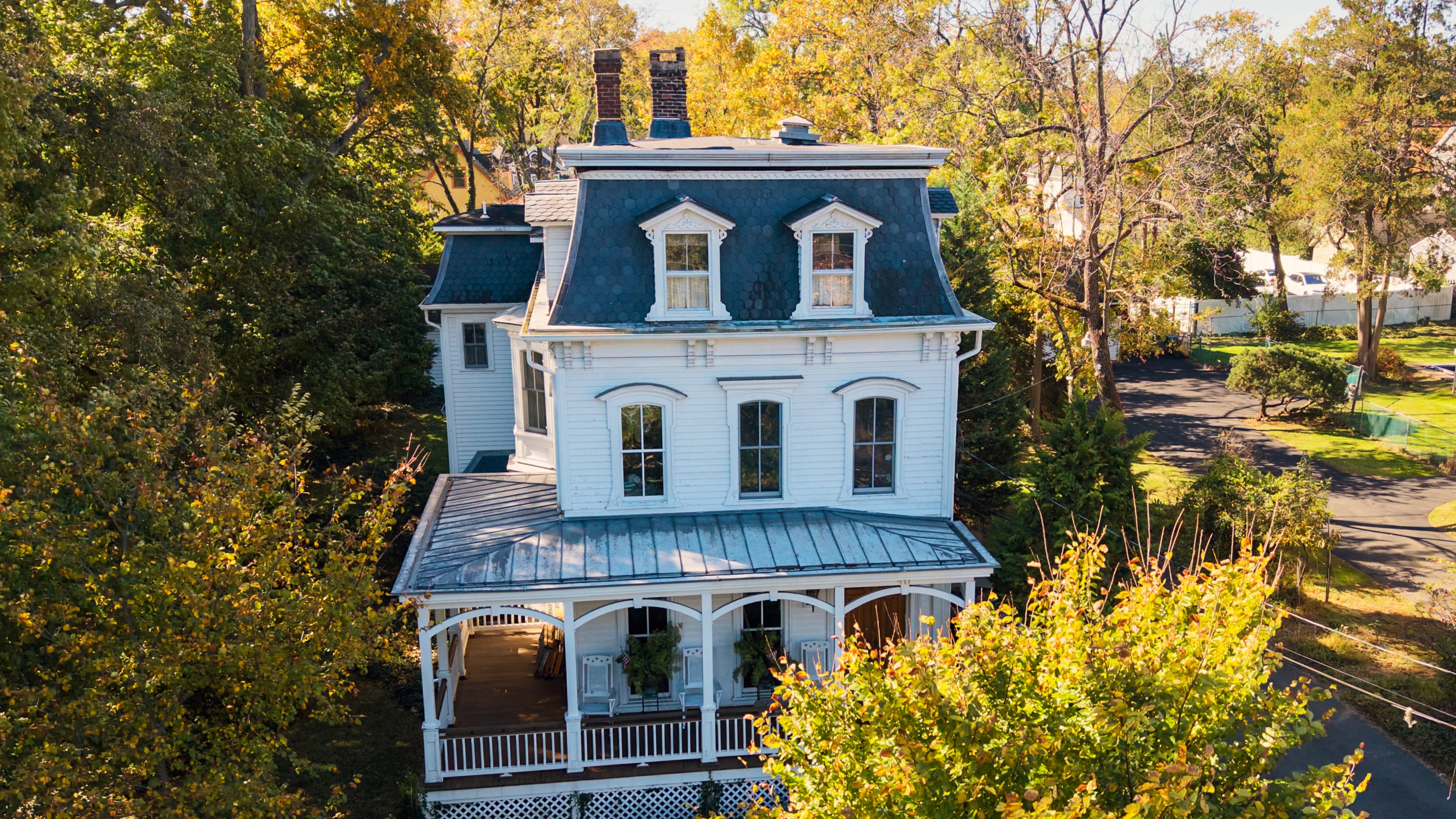 A Victorian house believed to have helped inspire cartoonist Charles Addams' fictional Addams Family mansion stands on Elm Street in Westfield, N.J., Thursday, Oct. 22, 2026. (AP Photo/Ted Shaffrey)
