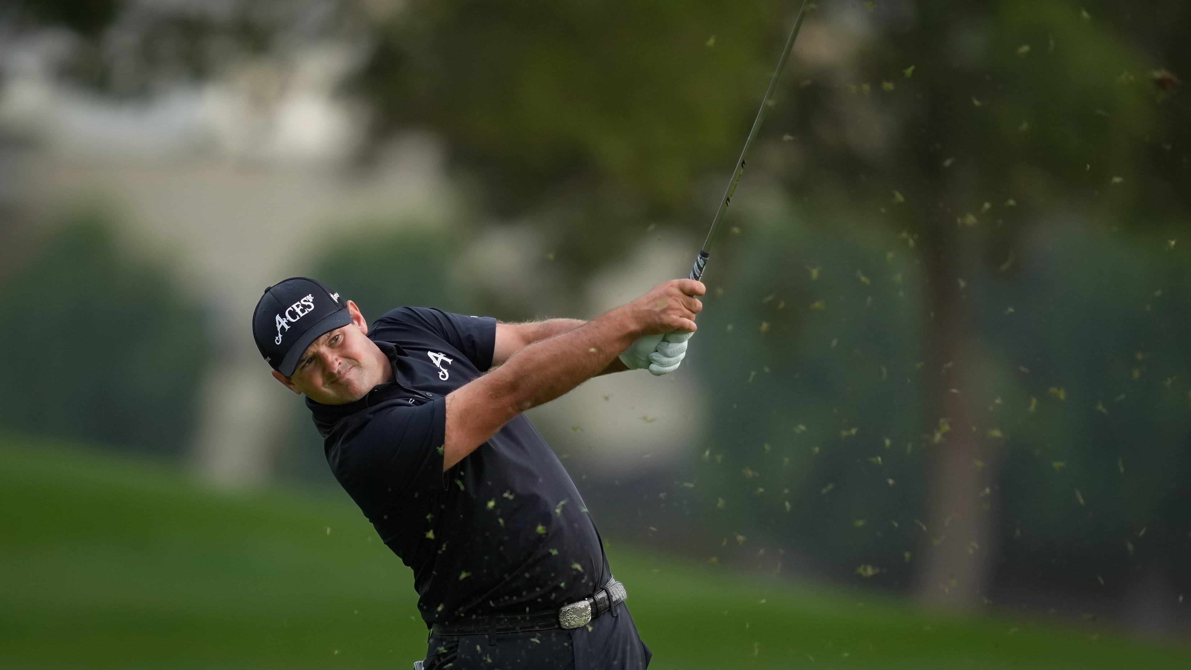 Patrick Reed of the United States plays his second shot on the 18th hole during the final round of the Dubai Desert Classic in United Arab Emirates, Sunday, Jan. 25, 2026. (AP Photo/Altaf Qadri)
