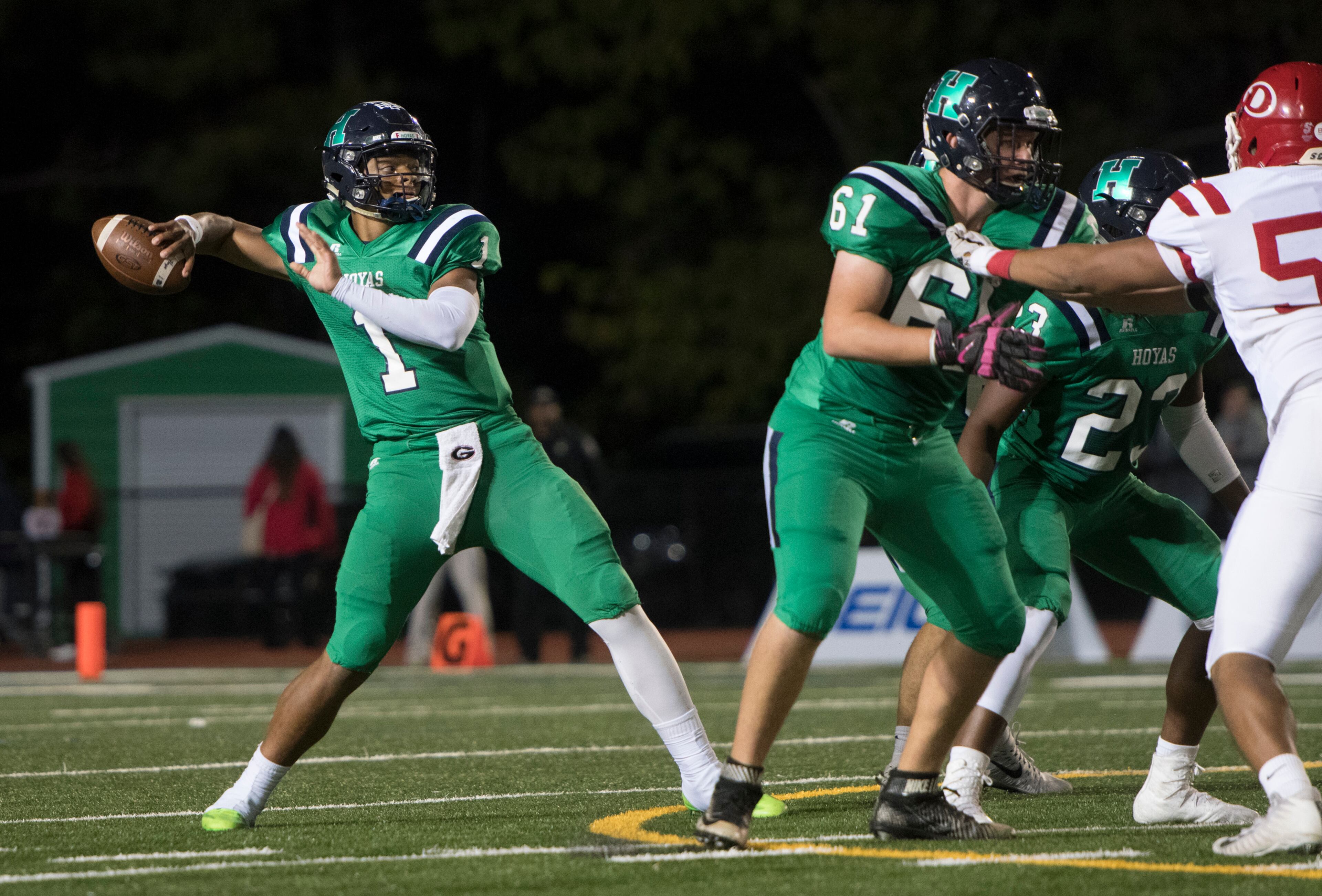 Harrison quarterback Justin Fields (1) passes against Dalton during a high school football game on Thursday, Oct. 19, 2017, in Kennesaw, Ga. (Special to the Atlanta Journal-Constitution, John Amis )
