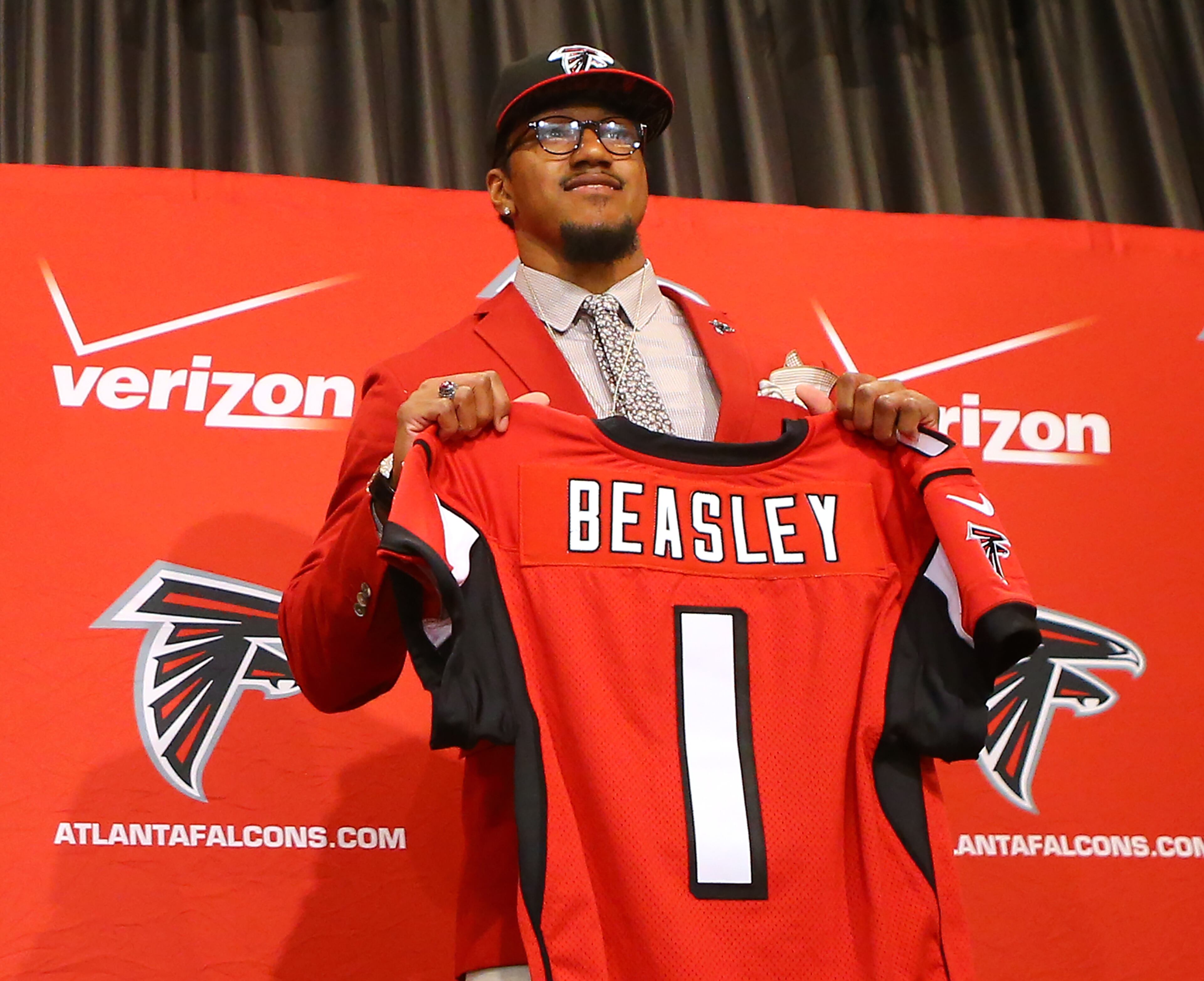 Falcons General Manager Thomas Dimitroff and head coach Dan Quinn introduce their first-round draft pick Vic Beasley at the Falcons training facility where he will hold a press conference with the team on Friday, May 1, 2015, in Flowery Branch. Beasley, who was the 8th overall pick in the NFL draft, is Clemson's all time sack leader. Curtis Compton / ccompton@ajc.com