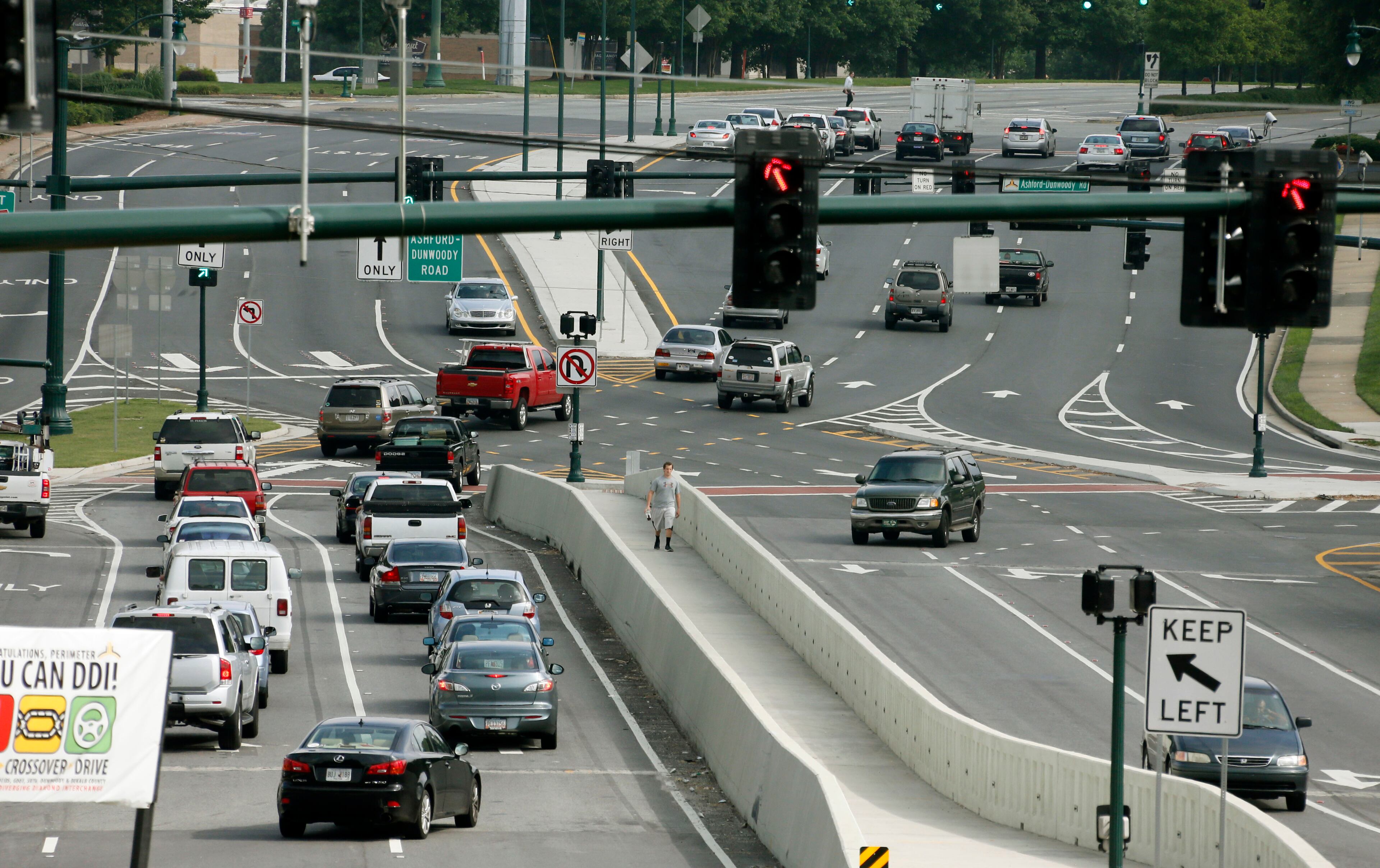 As Gwinnett County welcomes two newly redesigned interchanges, Dunwoody is celebrating the one-year anniversary of its diverging diamond at I-285 and Ashford Dunwoody Road. State and local officials spent three years and more than $6 million on the redesign that opened a year ago this month, the first of its kind in Georgia. Early numbers show the design reduced travel times and decreased accidents at the busy interchange that sees more than 55,000 vehicles a day. Click on to see photos from the June 2012 opening and more stats about how the diverging diamond has impacted the region in the past year.