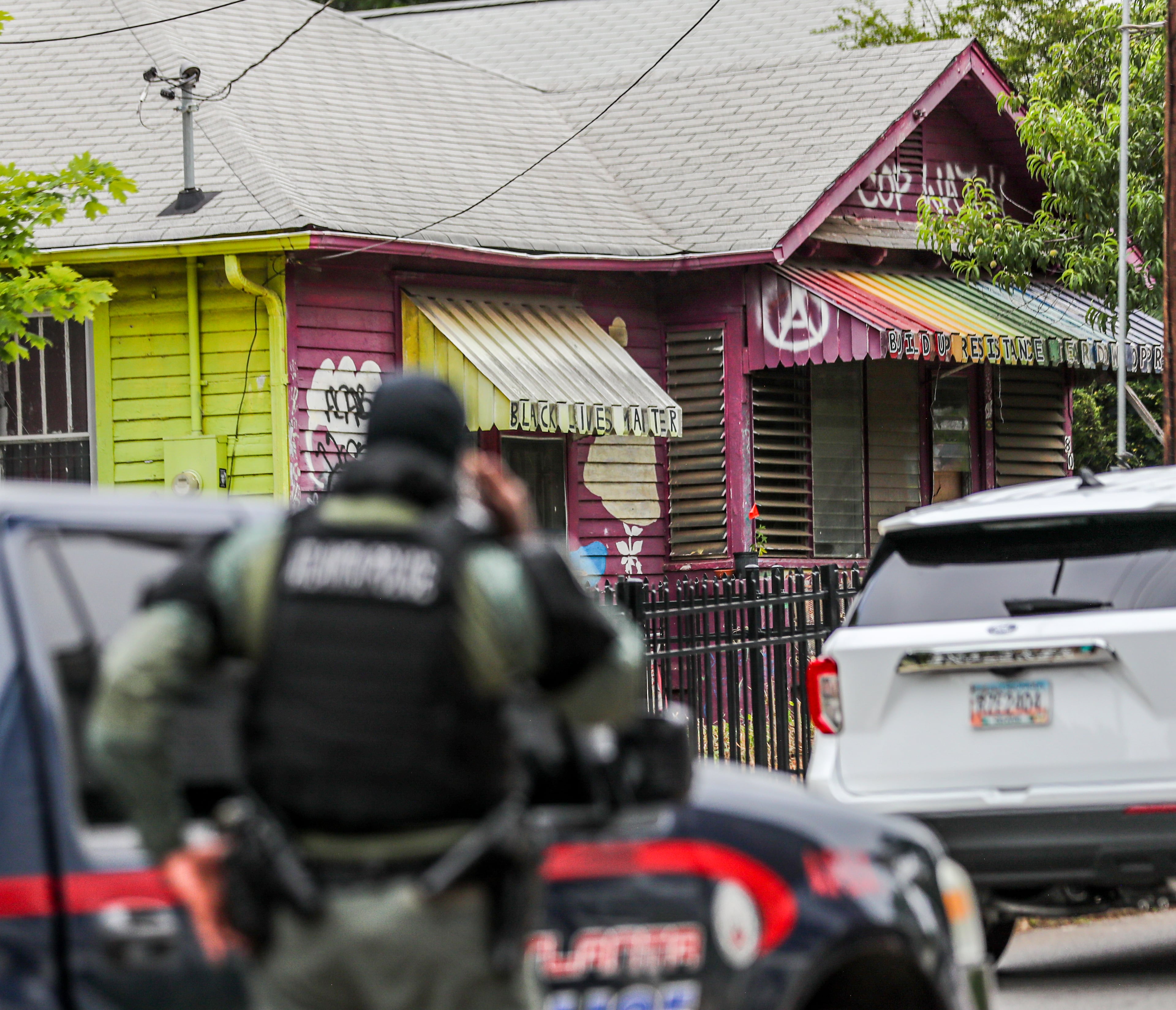 May 31, 2023 Atlanta: Atlanta police and the GBI work the scene on Mayson Avenue near Hardee Street in Atlanta in connection with alleged financial crimes committed at the future site of the public safety training center, as well as other metro locations. (John Spink / John.Spink@ajc.com)