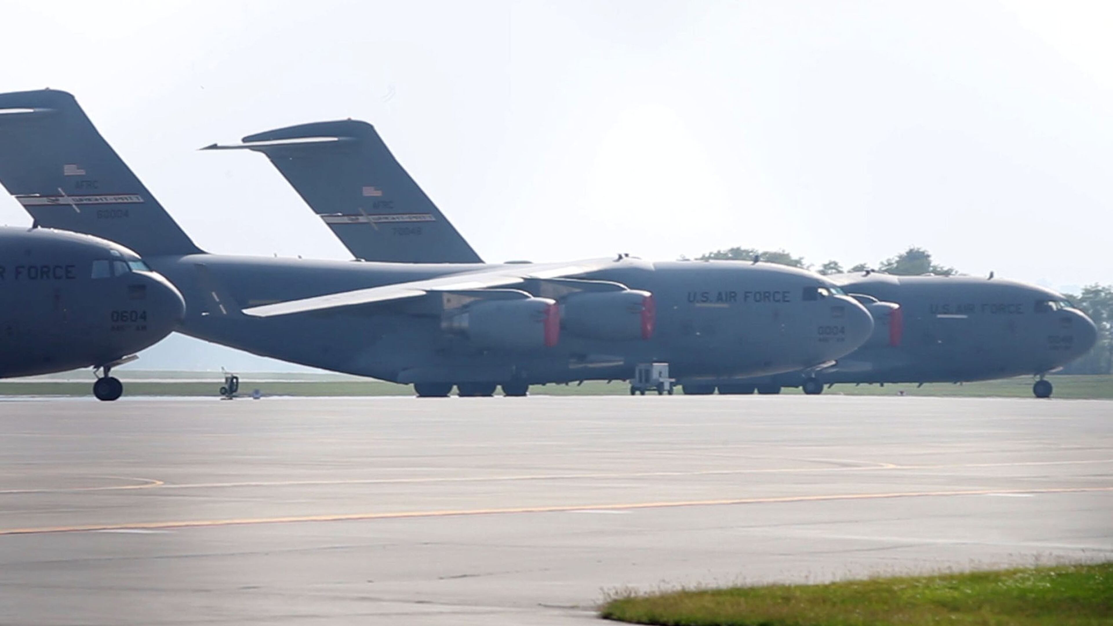 Six Air Force C-17 transport jets with the 445th Airlift Wing sit idle at Wright-Patterson Air Force Base during a partial federal government shutdown in 2013. TY GREENLEES / STAFF FILE PHOTO