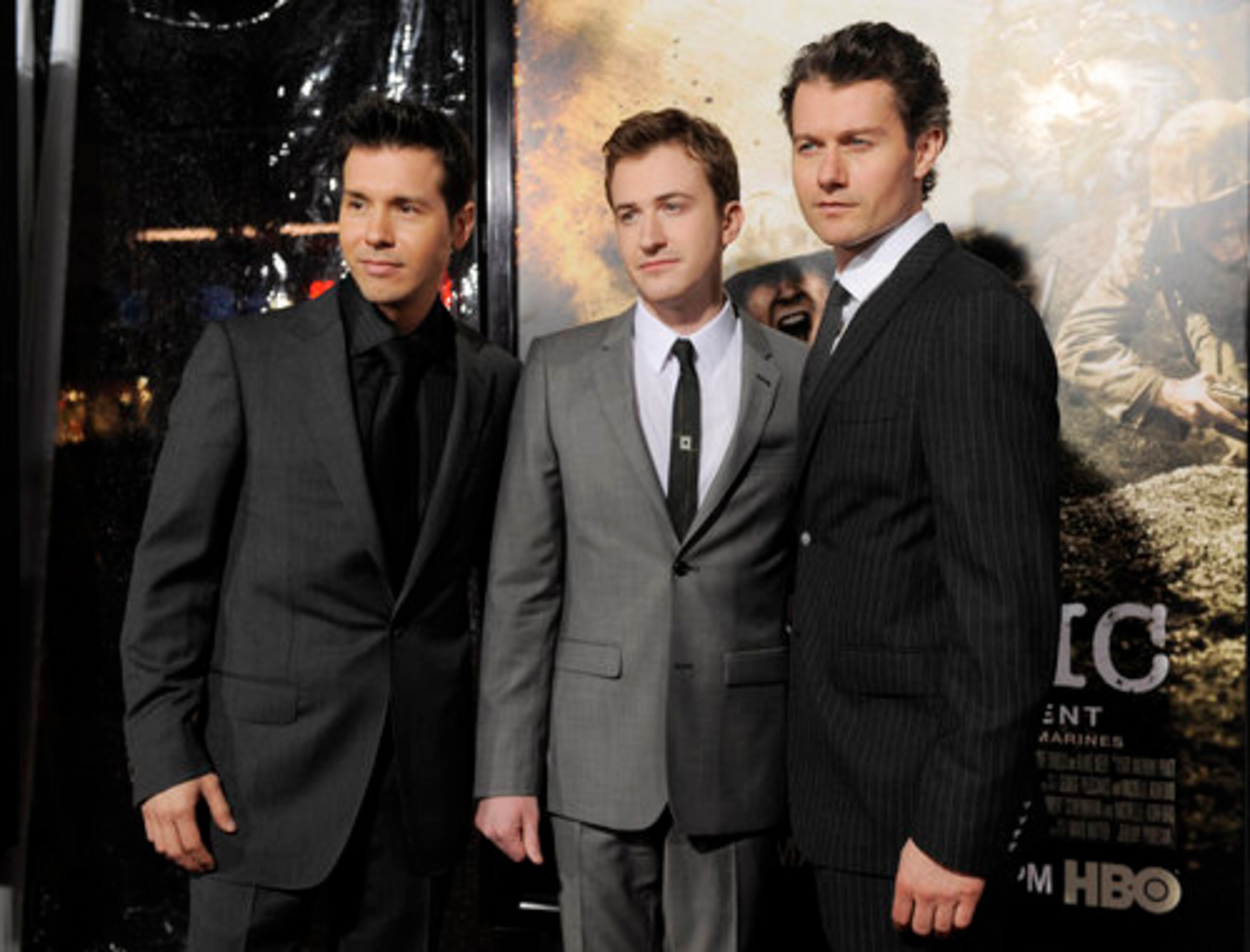 Jon Seda, left, Joe Mazzello, center, and James Badge Dale, who play U.S. Marines in "The Pacific, " pose together at the premiere.