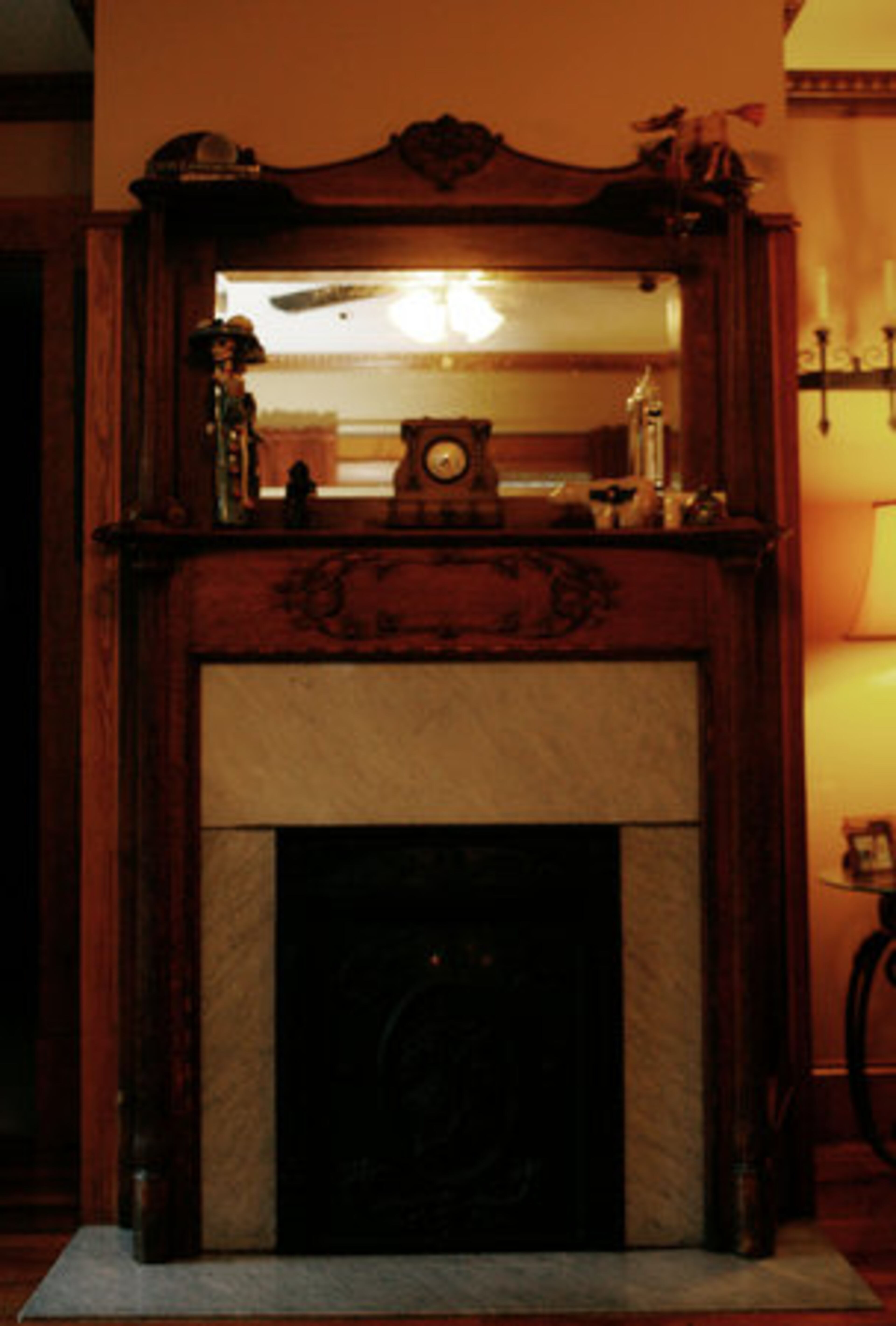A mantle dating back to the late 1800's welcomes visitors to the Bolognese/McCord home. The mix of housing on their street includes houses built over a 100-year span.
