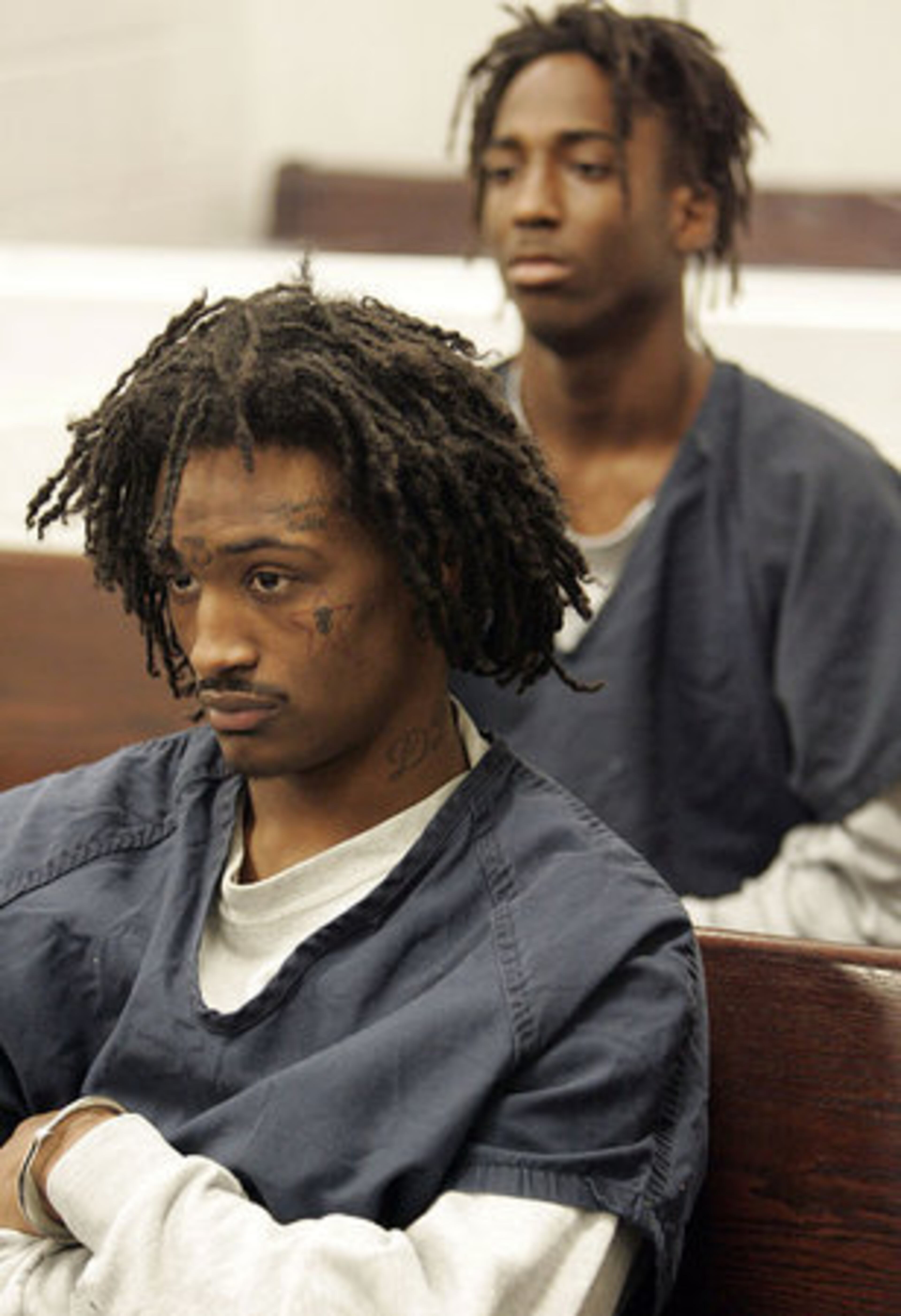 Johnquavious Hood (front) and Javorris Redding appeared in court Wednesday. Magistrate Jessy Lall set bond for Hood at $90,000 and denied bond for Redding.