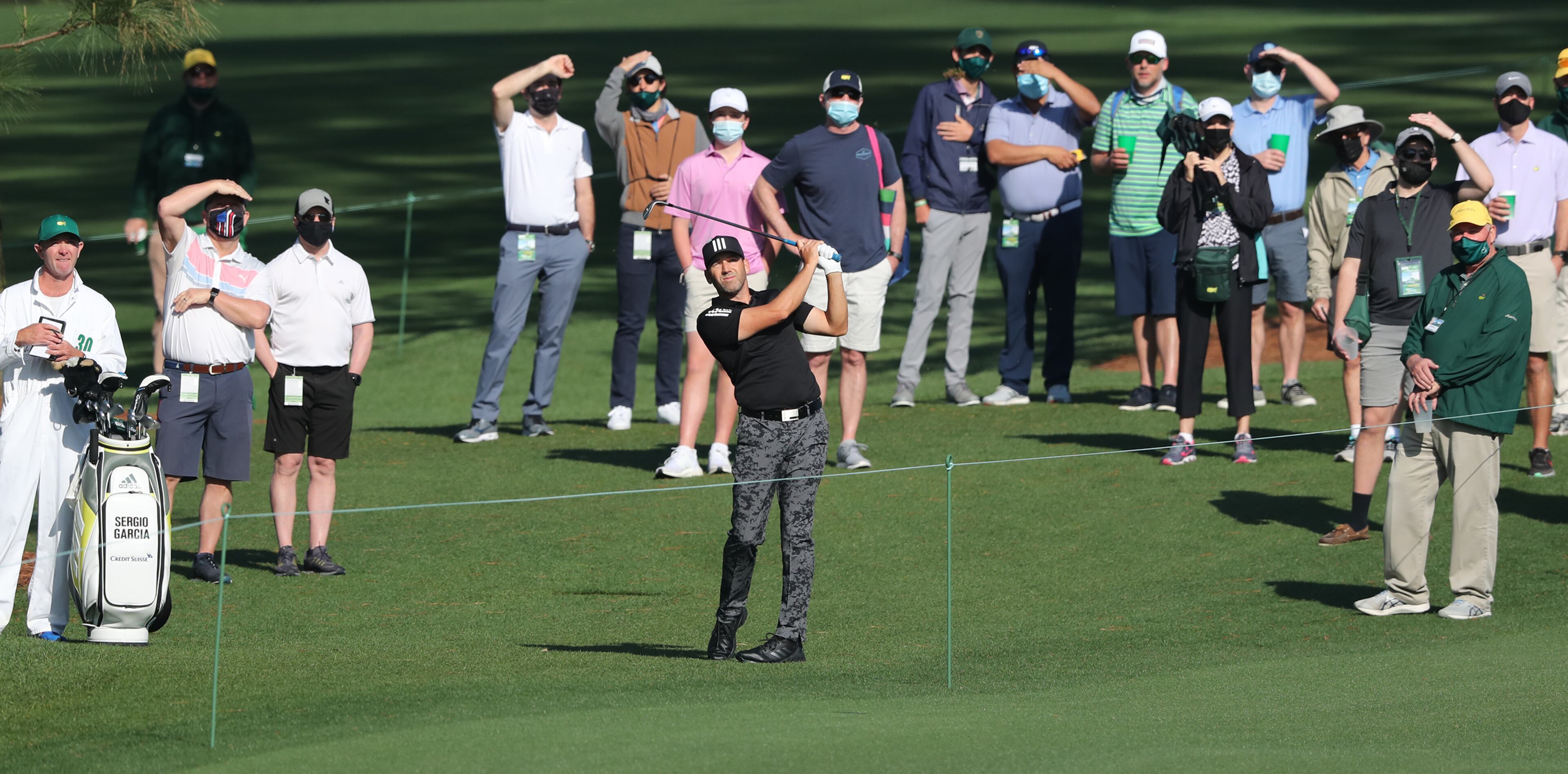 040621 Augusta: The 2017 Masters champion Sergio Garcia hits from the modest gallery to the second green during his practice round at Augusta National Golf Club on Tuesday, April 6, 2021, in Augusta. “Curtis Compton / Curtis.Compton@ajc.com”