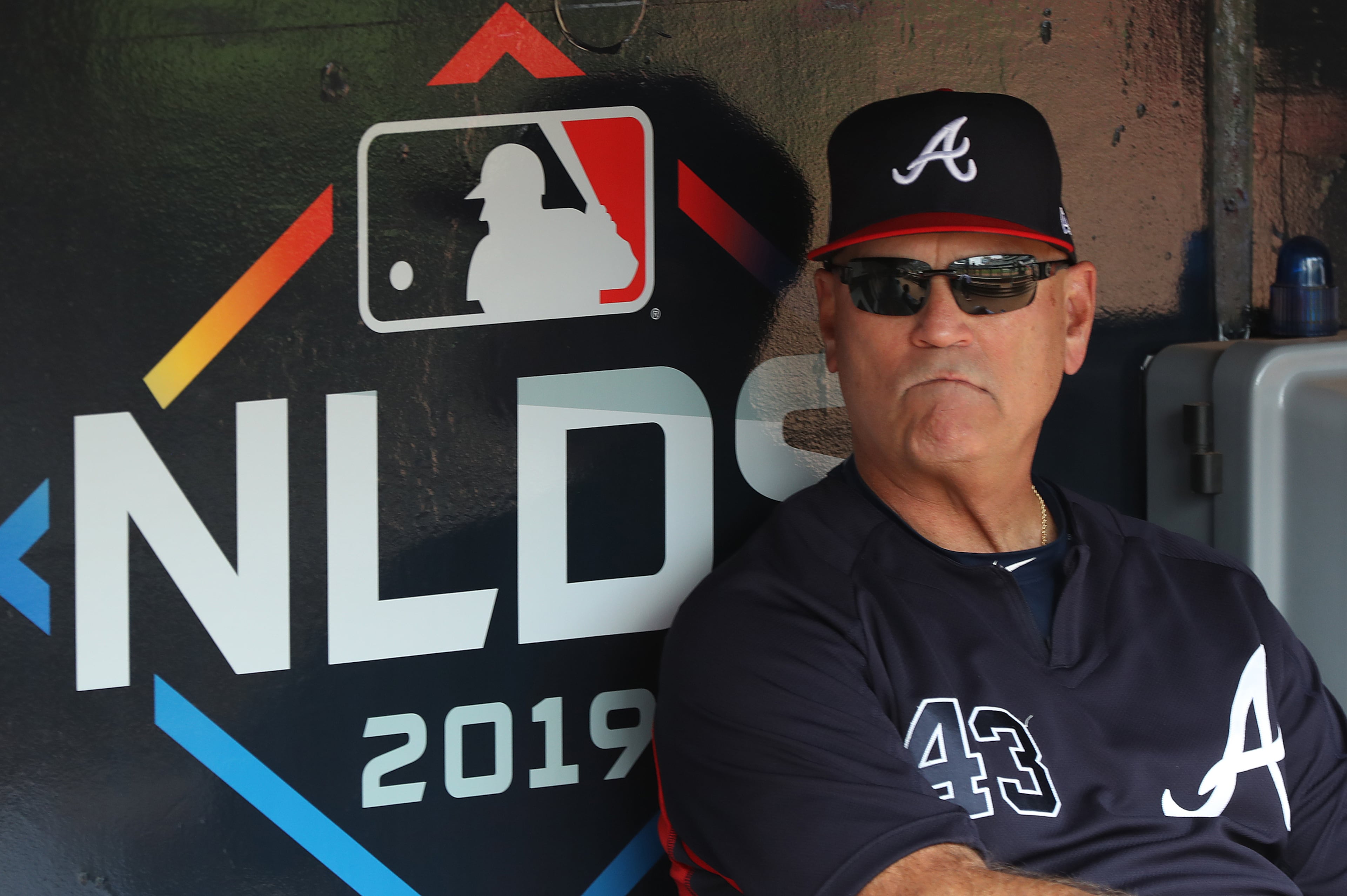 Braves manager Brian Snitker watches from the dugout. Curtis Compton/ccompton@ajc.com