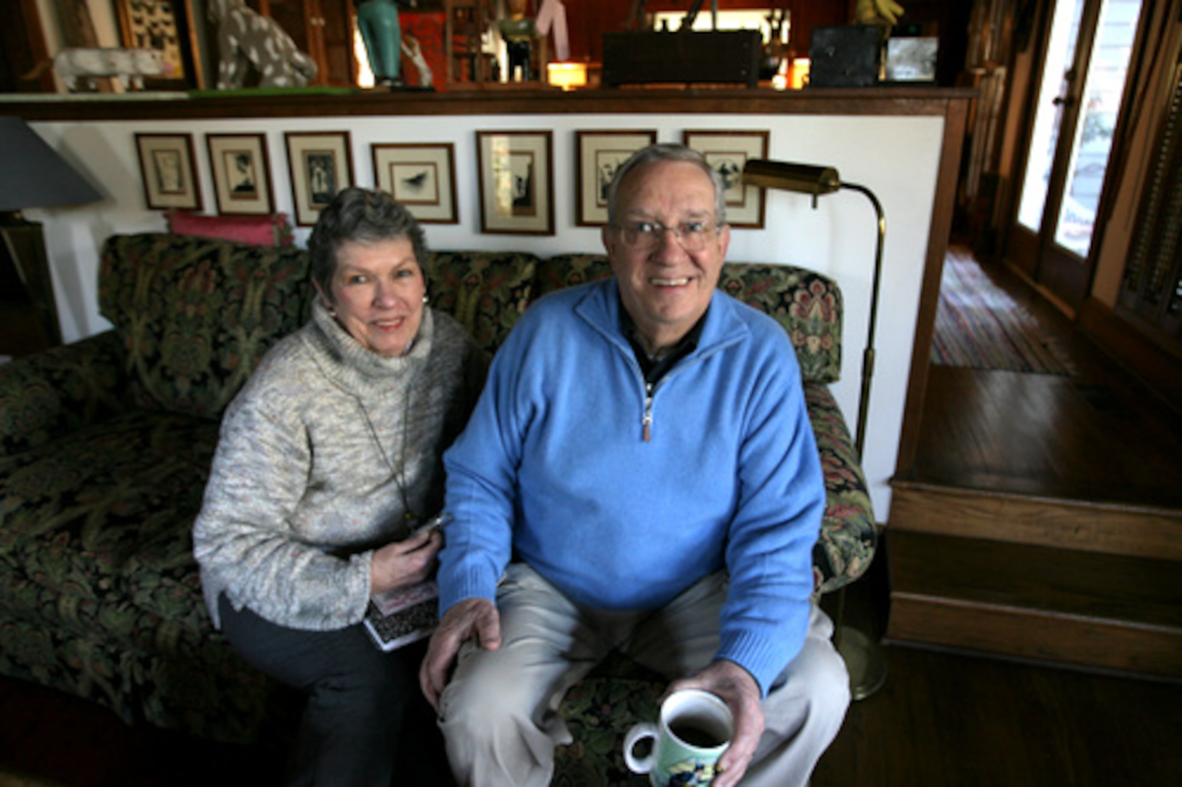 Jim and Dona Cole in their Cobb County home, where they have amassed an impressive collection of folk art.