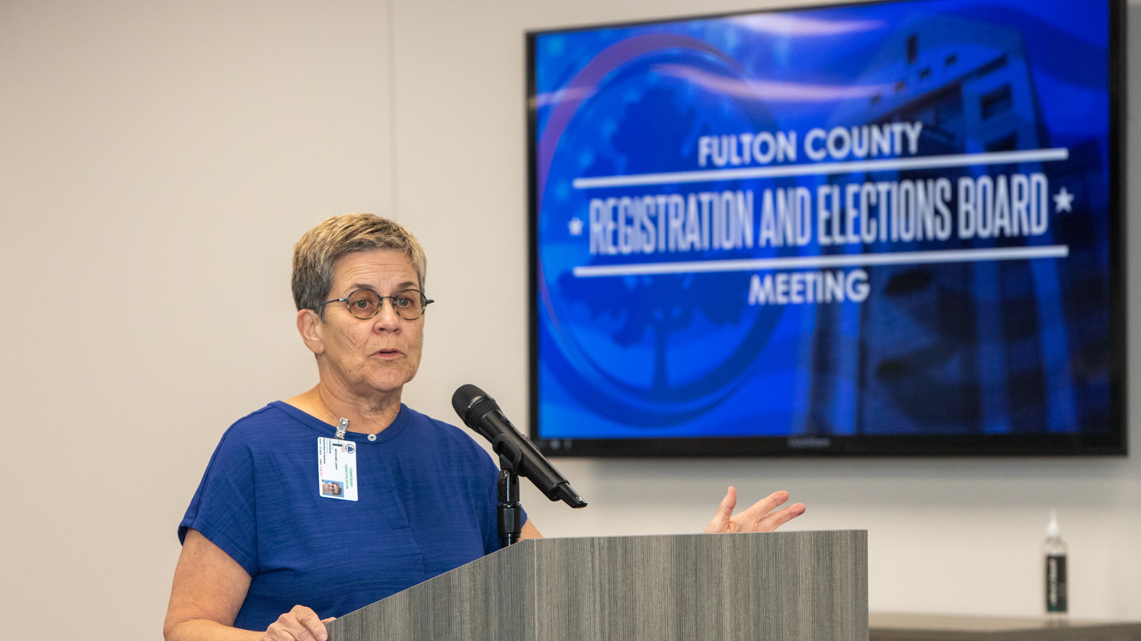 Members of the Fulton County Registration and Elections Board including Chairperson Cathy Woolard addresses the crowd on Tuesday, June 18, 2024. (Jenni Girtman for The Atlanta Journal-Constitution)