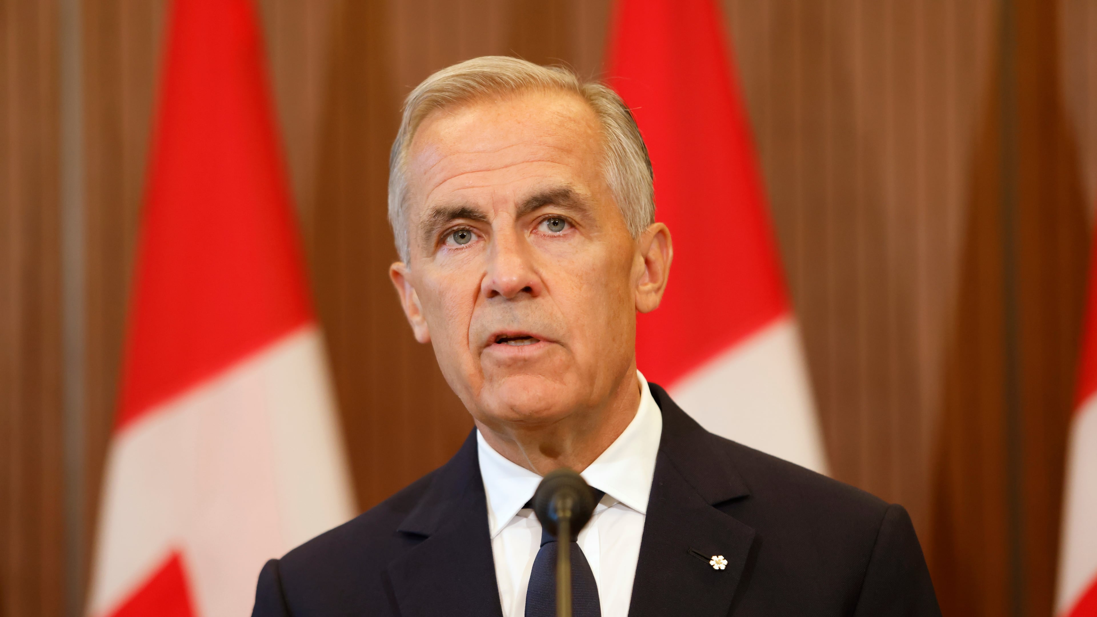 Prime Minister Mark Carney speaks about Canada's response to new U.S. tariffs during a news conference on Parliament Hill in Ottawa on Saturday, Aug. 22, 2026. (Patrick Doyle/The Canadian Press via AP)