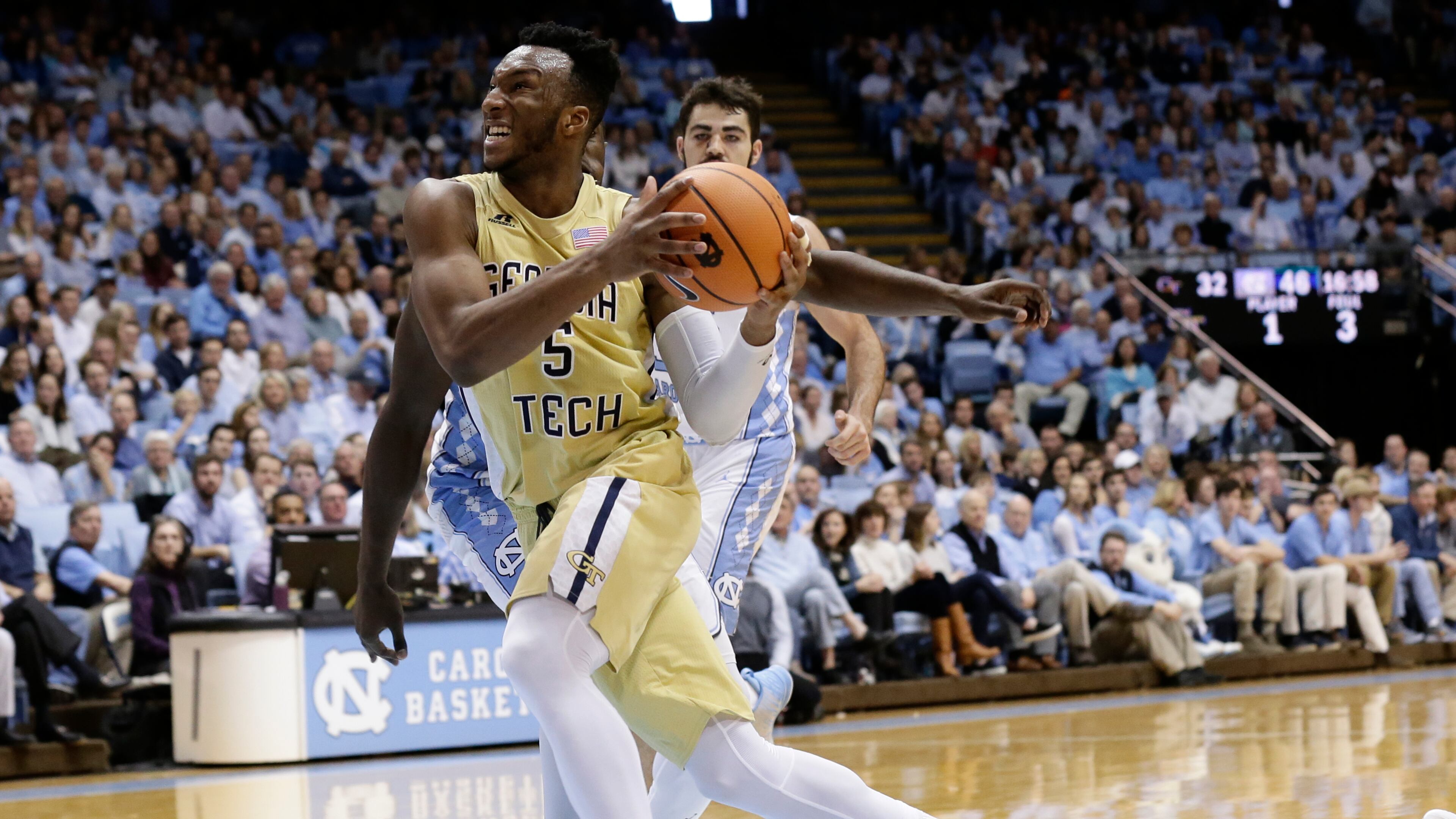 Georgia Tech's Josh Okogie drives to the basket against North Carolina during the second half of an NCAA college basketball game in Chapel Hill, N.C., Saturday, Jan. 20, 2018. North Carolina won 80-66. (AP Photo/Gerry Broome)