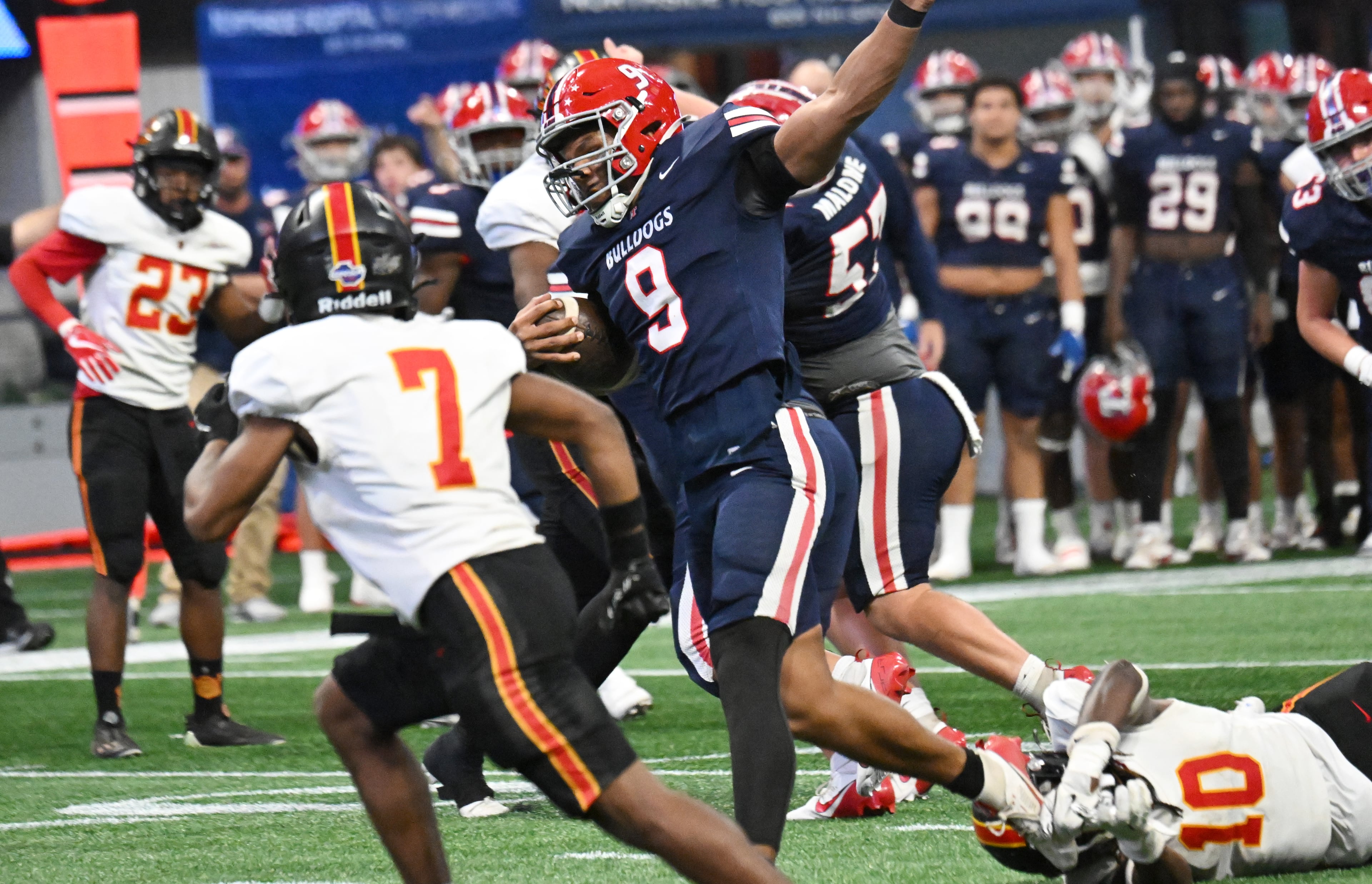 Toombs County's Justin Powell (9) runs for a touchdown during the fourth quarter in GHSA Class A-Division State Championship game at Mercedes-Benz Stadium, Tuesday, December 17, 2024, in Atlanta. Toombs County won 38-18 over Northeast Macon. (Hyosub Shin / AJC)