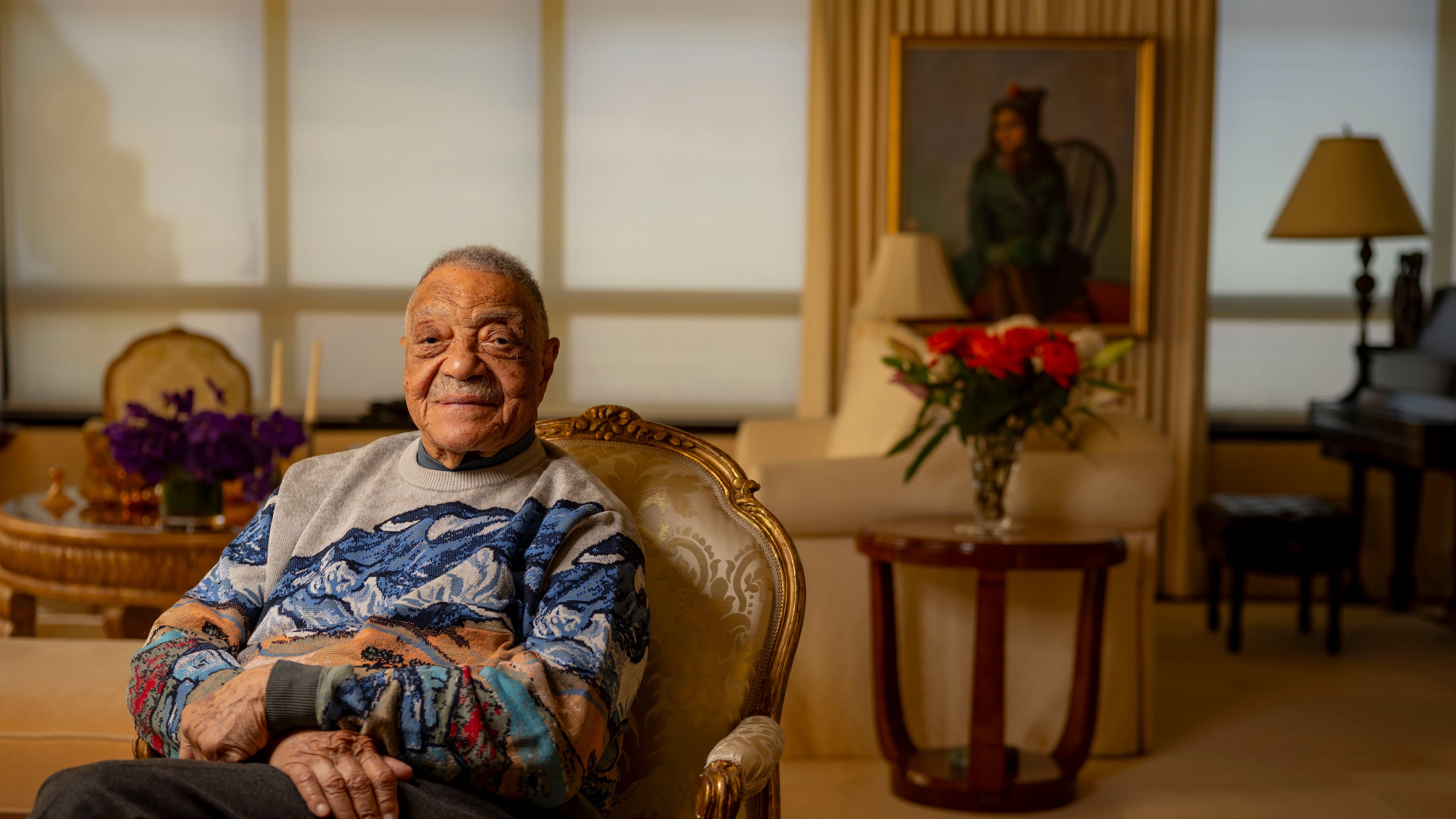 George E. Johnson Sr. sits in his Chicago home Tuesday, Feb. 18, 2025. (Brian Cassella/Chicago Tribune via AP)