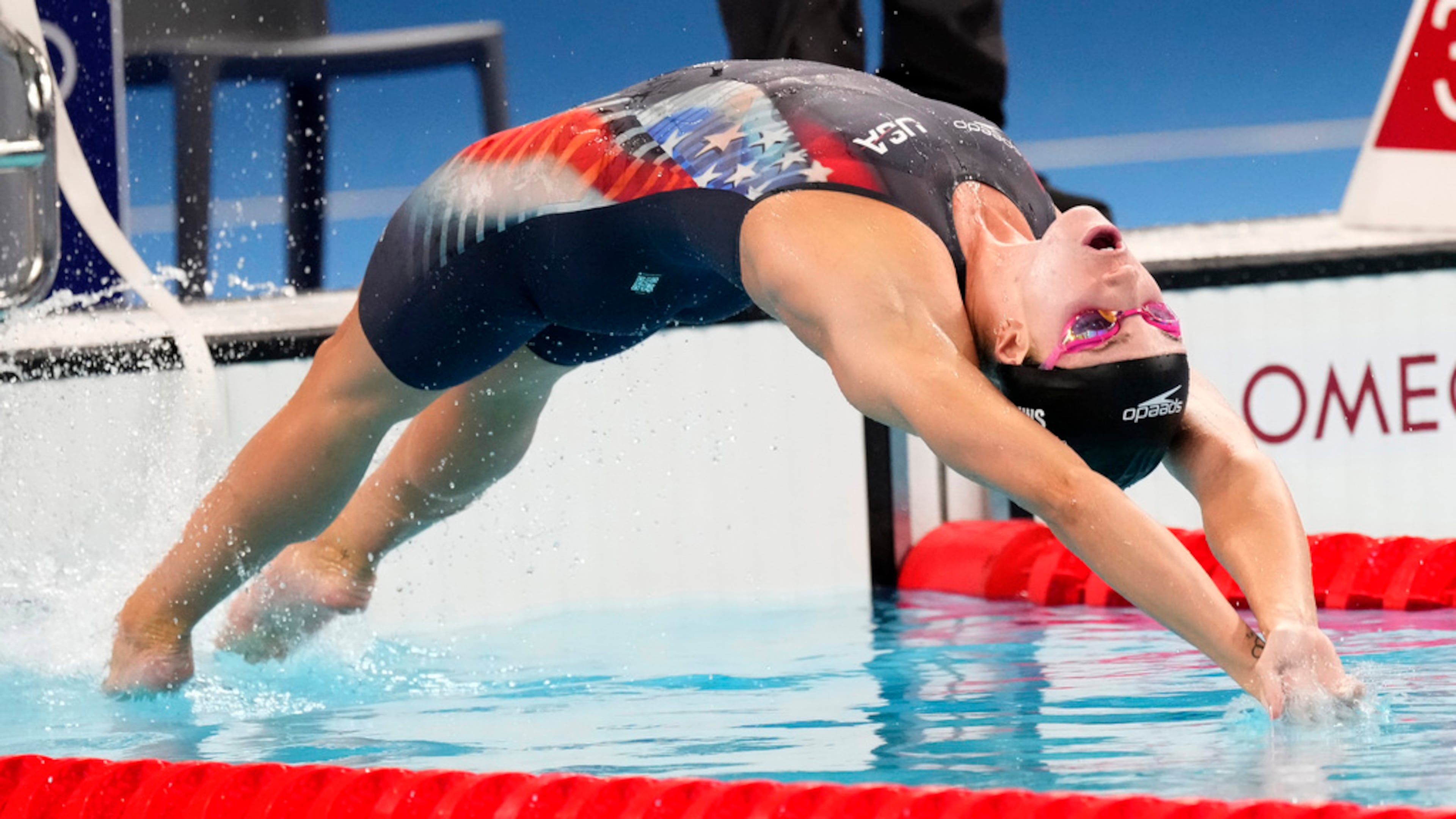 Regan Smith, of the United States, competes during a women's 100-meter backstroke semifinal at the 2024 Summer Olympics, Monday, July 29, 2024, in Nanterre, France. (AP Photo/Martin Meissner)