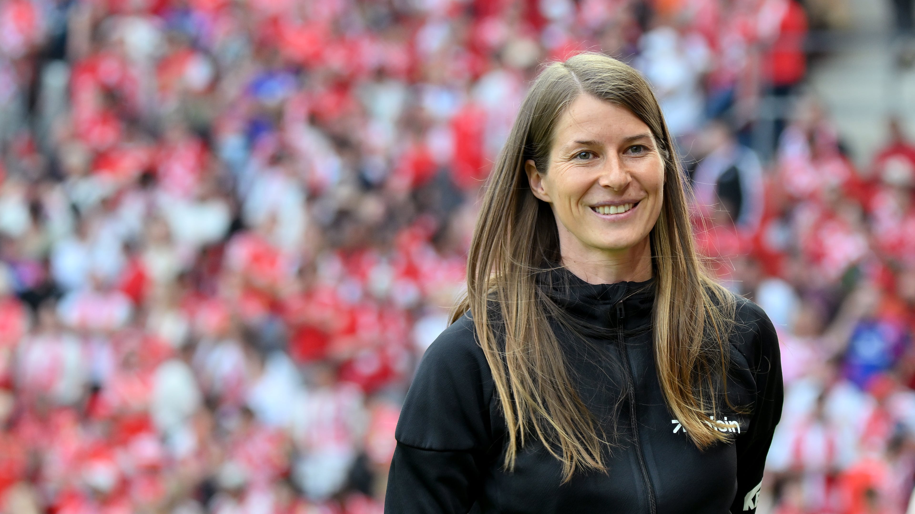 Union Berlin's coach Marie-Louise Eta smiles before the German Bundesliga soccer match between 1. FSV Mainz 05 and 1. FC Union Berlin in Mainz, Germany, Saunday, May 10, 2026. (Torsten Silz/dpa via AP)