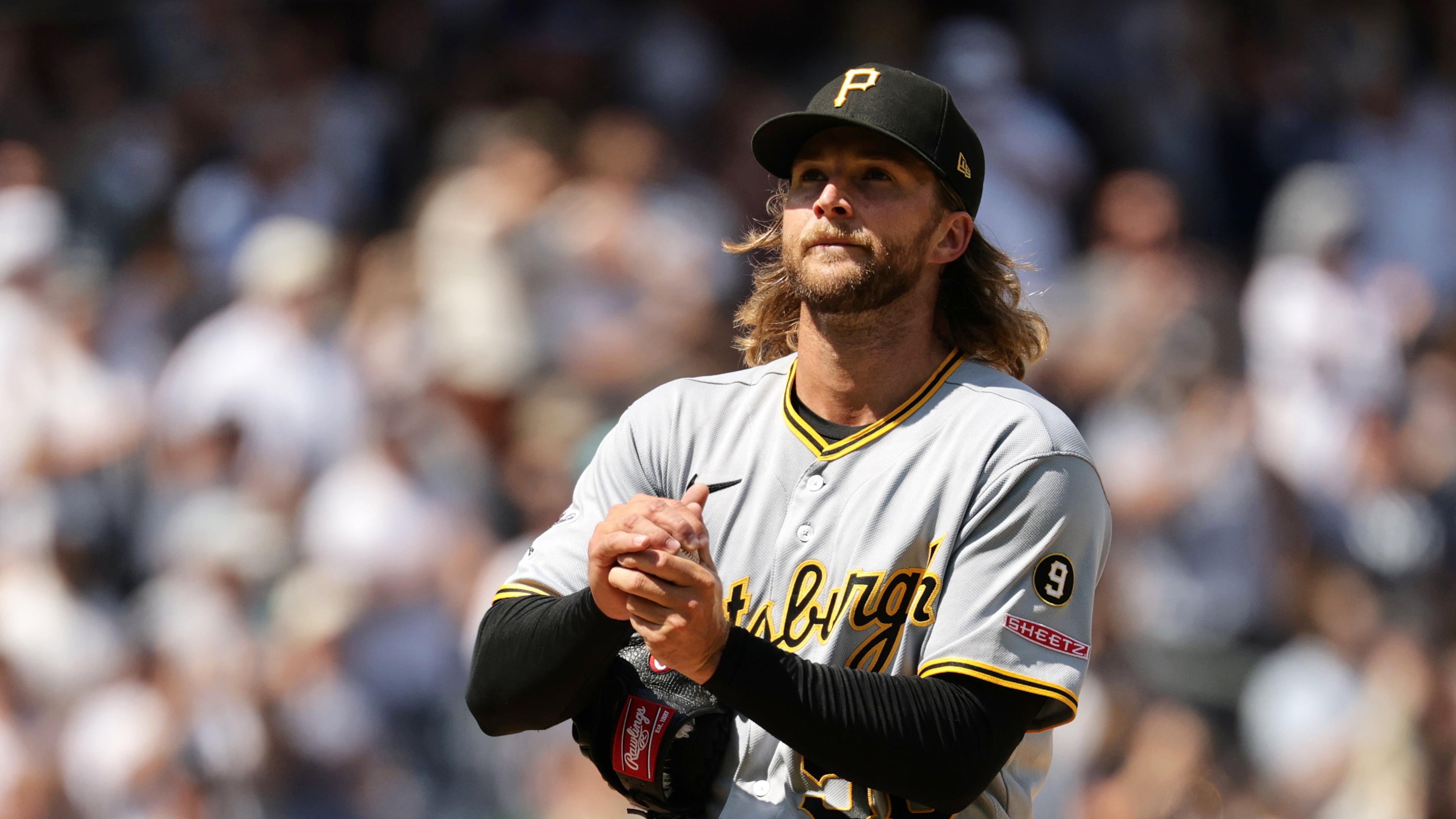 Pittsburgh Pirates pitcher Carmen Mlodzinski reacts after giving up a three-run home run to New York Yankees' Ben Rice in the seventh inning during the first baseball game of a doubleheader, Wednesday, July 22, 2026, in New York. (AP Photo/Adam Hunger)