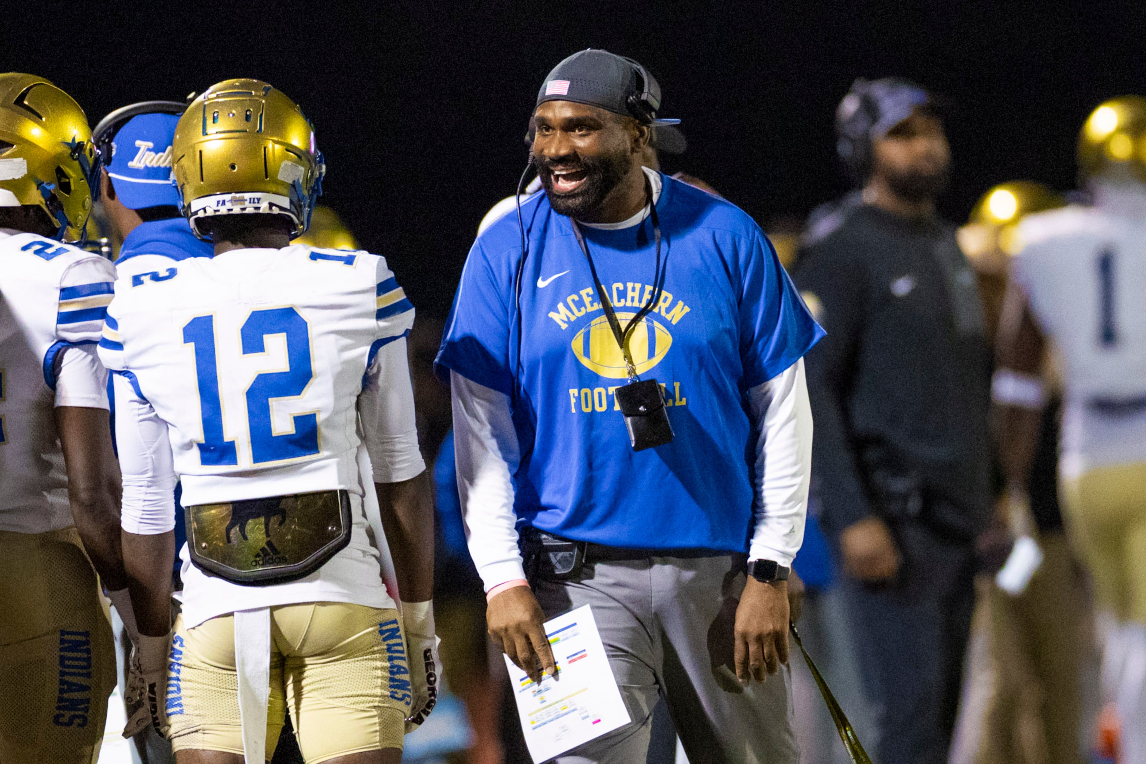 McEachern head coach Kareem Reid motivates his players against Hillgrove at Cobb Energy Hillgrove Stadium in Powder Springs, GA on Friday, Oct. 17th, 2025. (Oscar Guevara Saenz for the AJC)