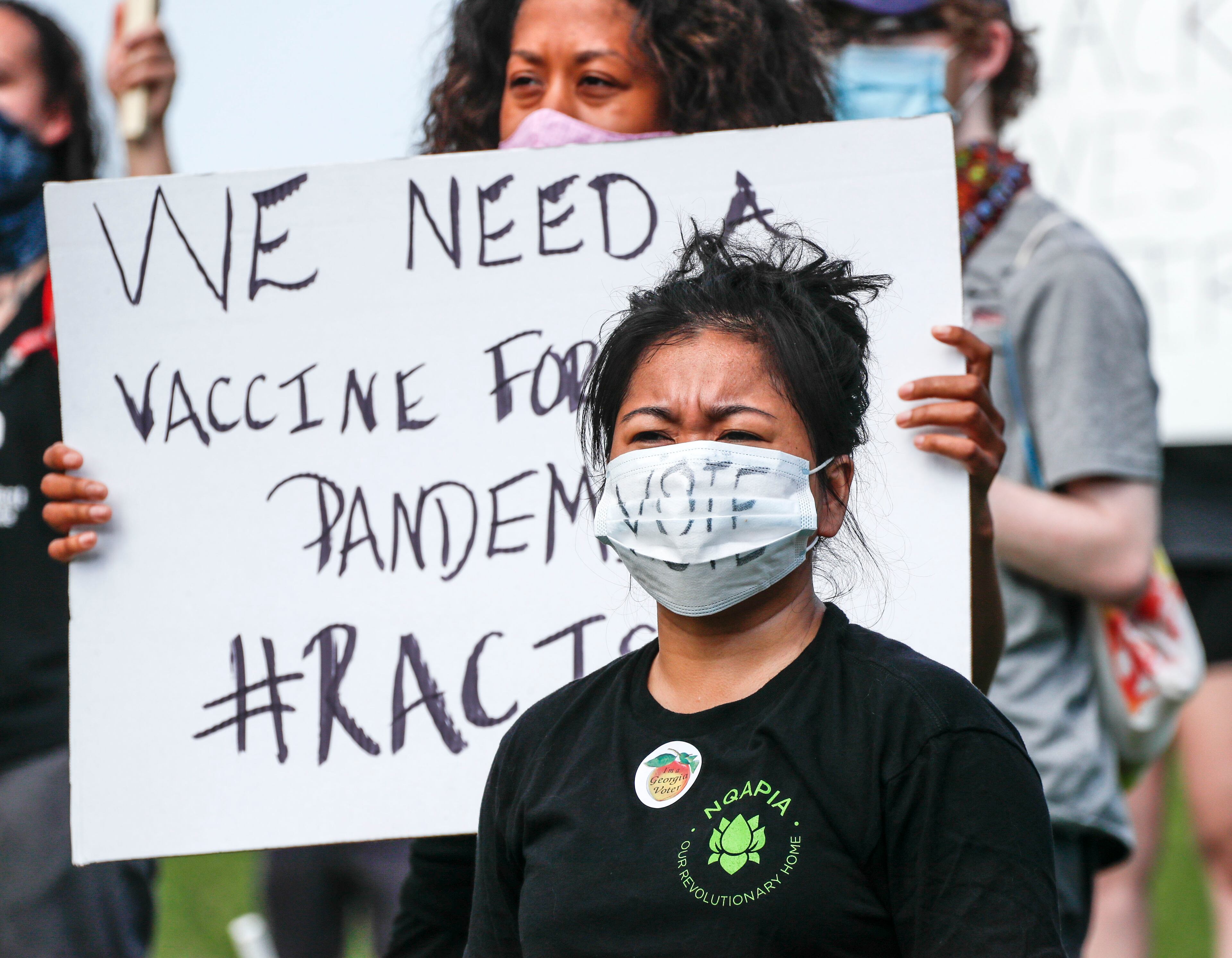 6/2/20 - Atlanta - Car horns blared in support as several hundred protestors gathered at Freedom Park in Atlanta, and marched down Freedom Trail to the BeltLine. Bob Andres / bandres@ajc.com