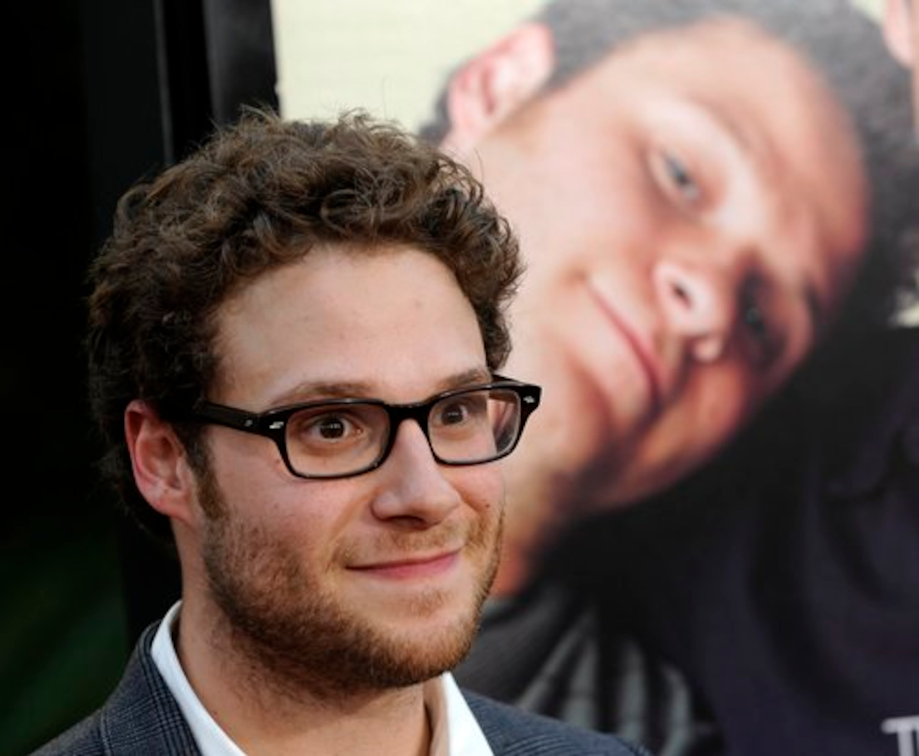 Seth Rogen, another cast member, arrives at the premiere of "Funny People." The film, which opens July 31, was written, directed and produced by Judd Apatow.