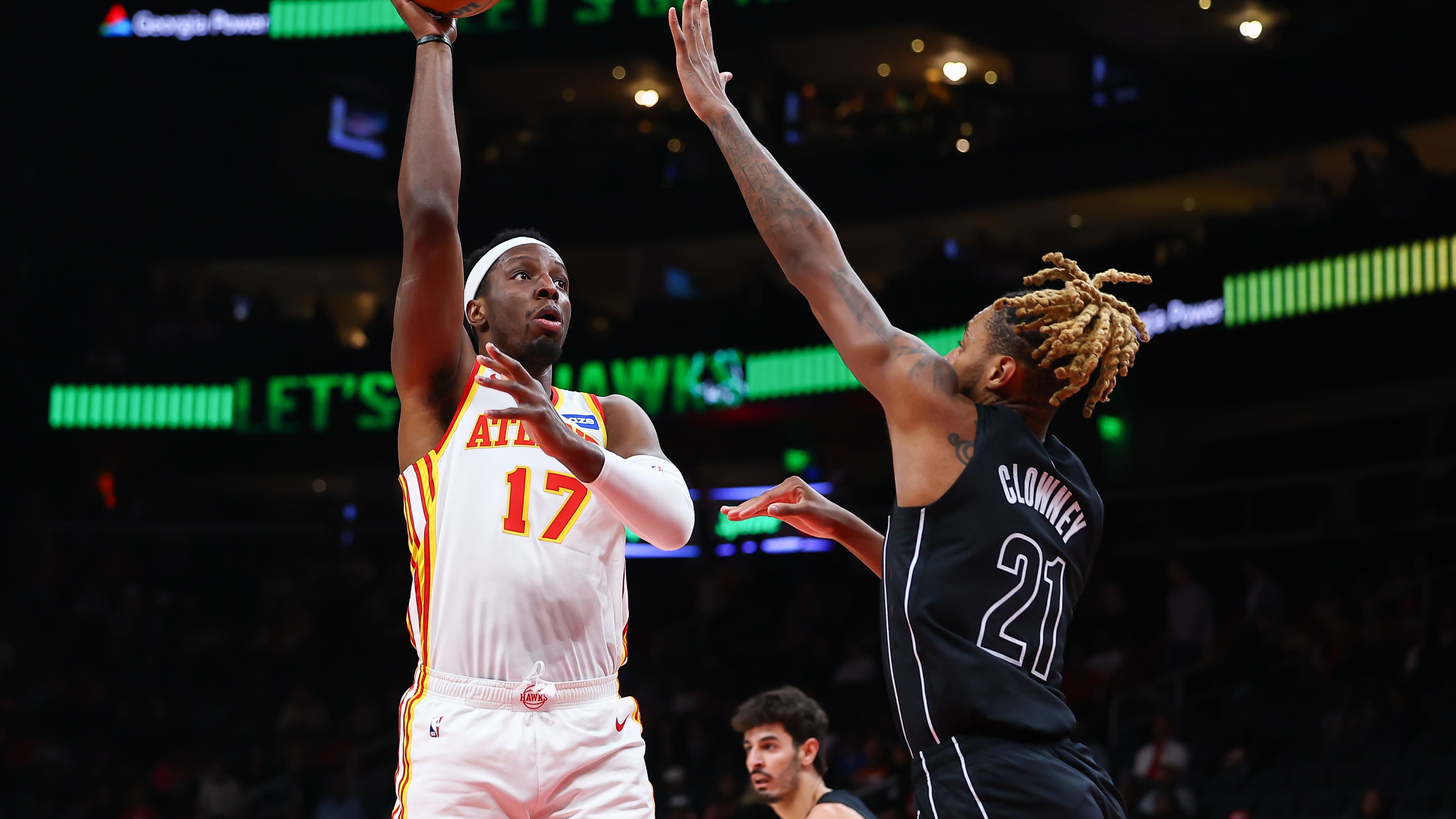 Atlanta Hawks forward Onyeka Okongwu (17) shoots against Brooklyn Nets forward Noah Clowney (21) during the first half of an NBA basketball game, Thursday, March 12, 2026, in Atlanta. (AP Photo/Colin Hubbard)