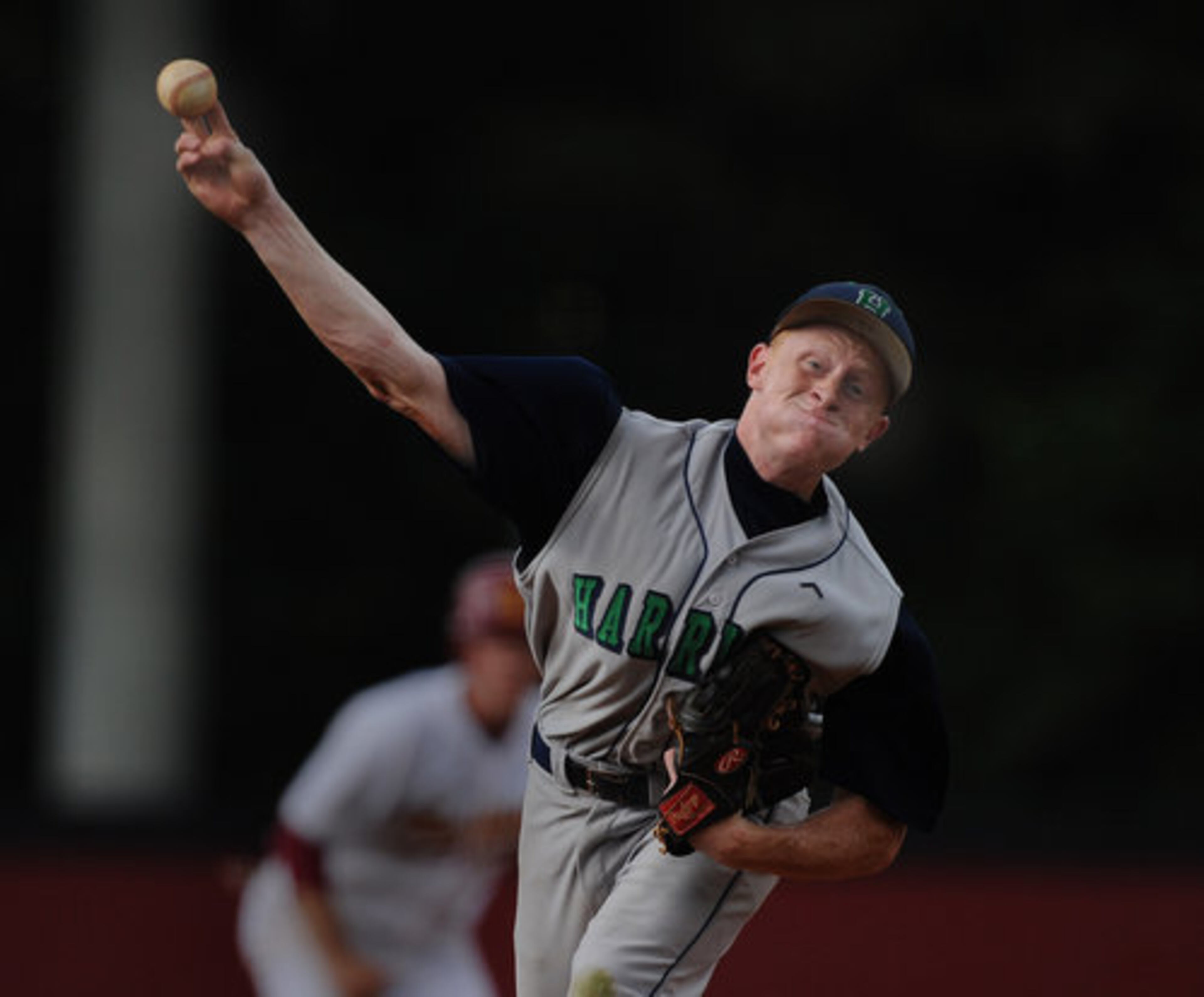 Harrison High School's Matt Gonzalez throws a strike in the 7th inning.