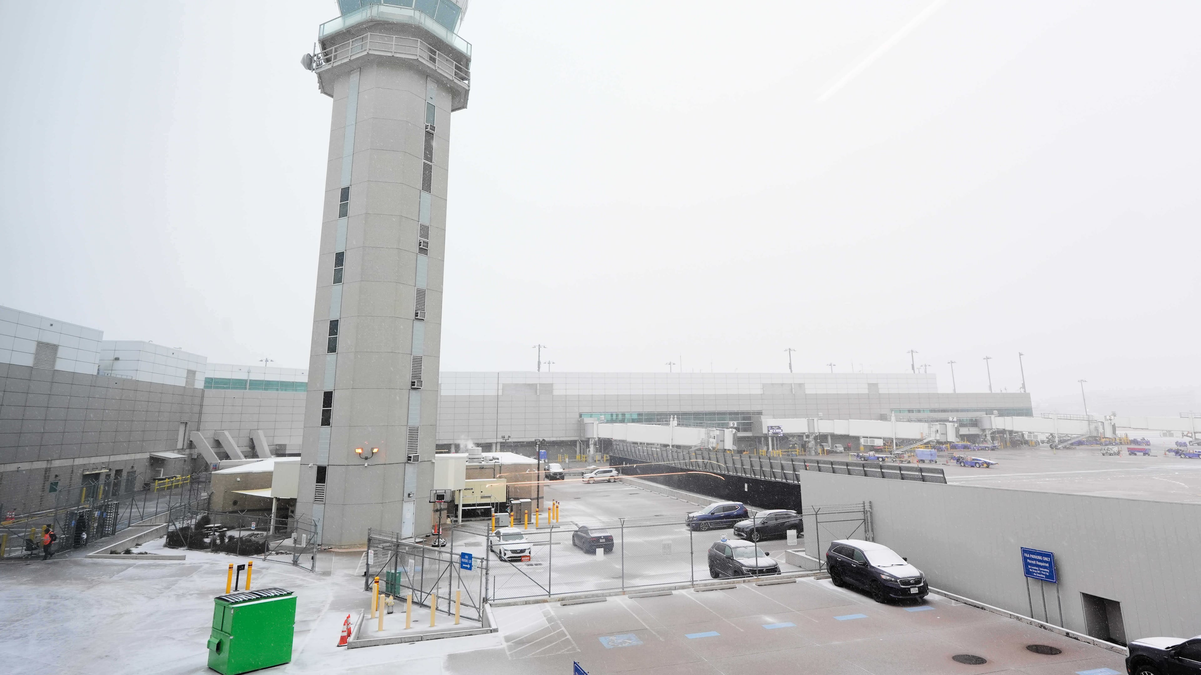 The control tower at Love Field Airport is shown where weather conditions have had an impact on travel in and out of the normally busy airport Saturday, Jan. 24, 2026, in Dallas. (AP Photo/Tony Gutierrez)