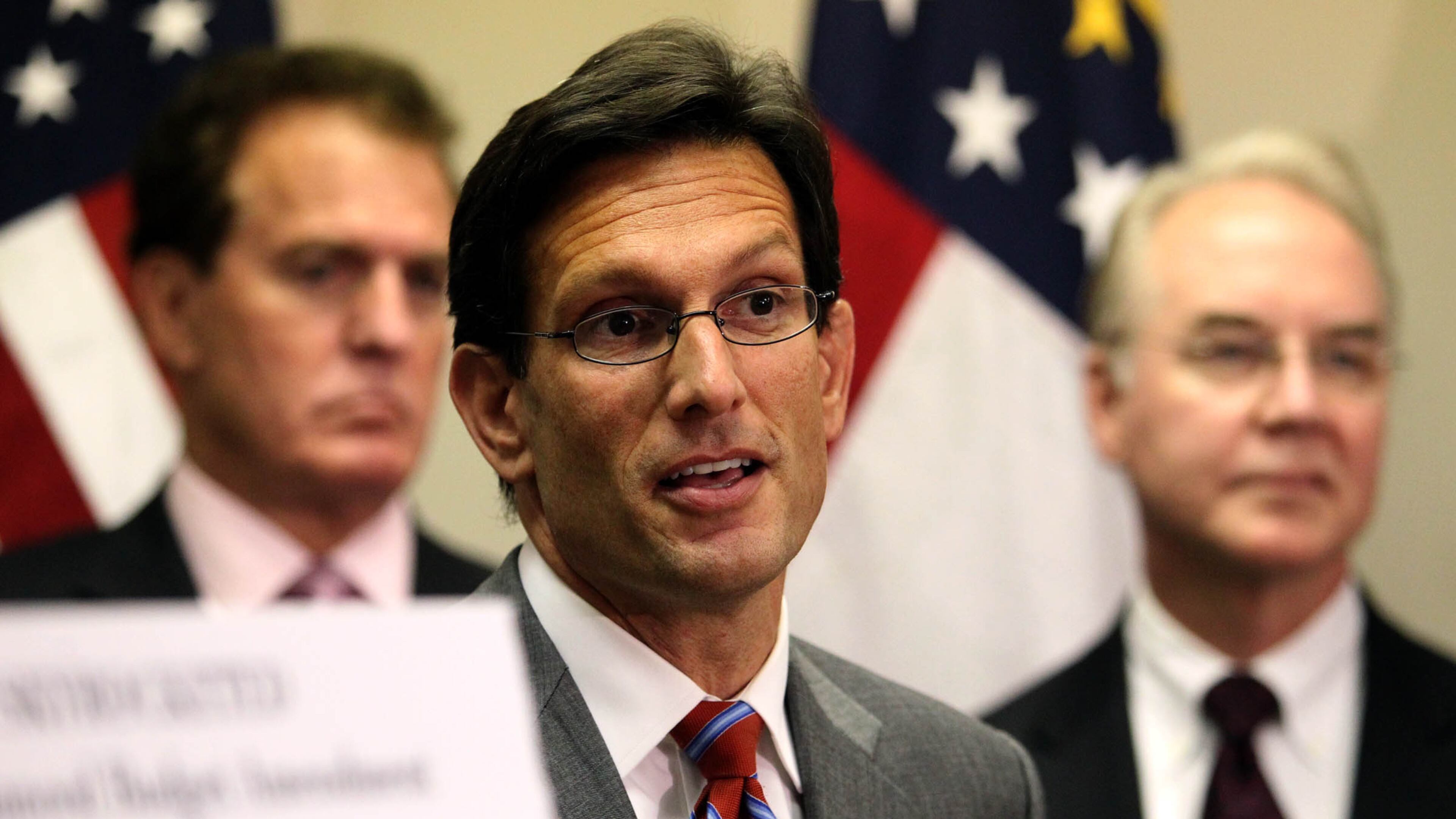110927 Atlanta; House Majority Leader Eric Cantor stands with Georgia congressman during a press conference as he prepares to join Georgia's Republican congressmen at the state Republican Party headquarters today in support of adopting a balanced budget amendment Tuesday afternoon in Atlanta. Ga., September 27, 2011. Jason Getz jgetz@ajc.com House Majority Leader Eric Cantor stands with Georgia congressman during a 2011 press conference. AJC file