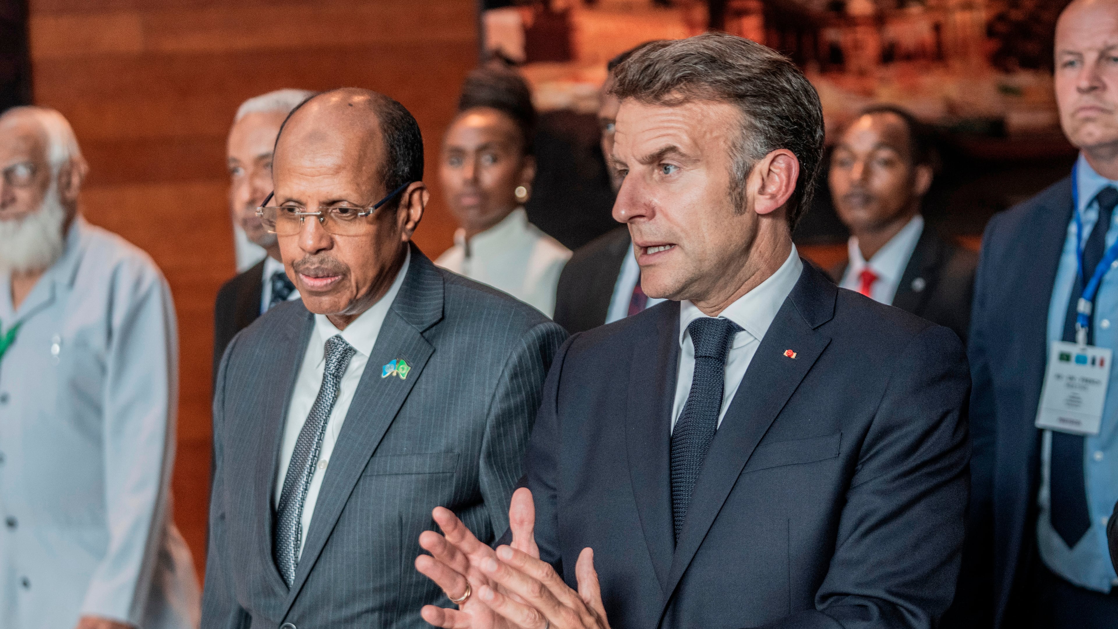 African Union Commission Chairperson Mahmoud Ali Youssouf and France's President Emmanuel Macron, right, interact at the African Union headquarters in Addis Ababa, Ethiopia, Wednesday, May 13, 2026. (AP Photo/Amanuel Sileshi)