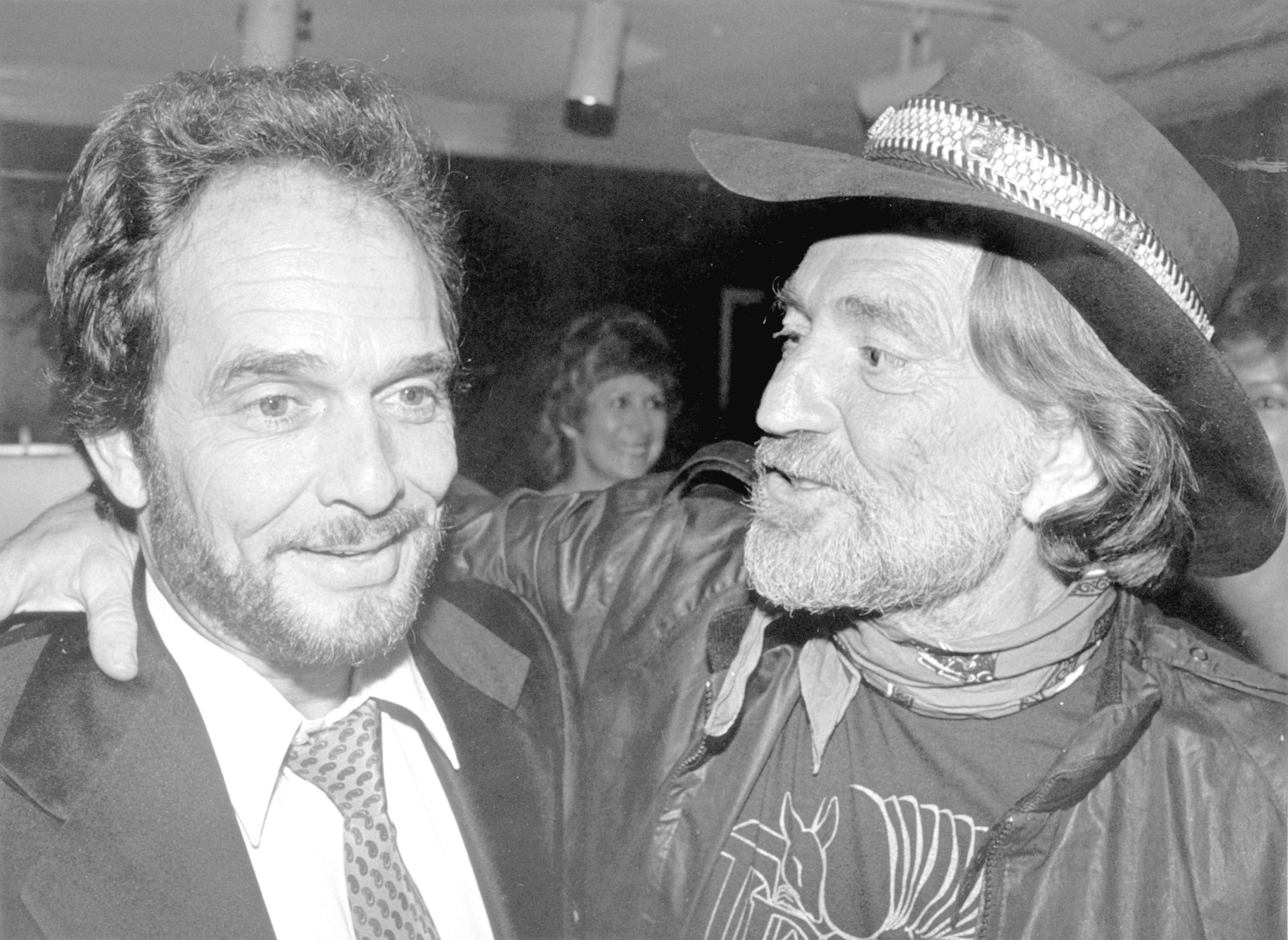 Merle Haggard, left, and Willie Nelson attend the BMI awards dinner in Nashville in October 1981. (Los Angeles Times/TNS)