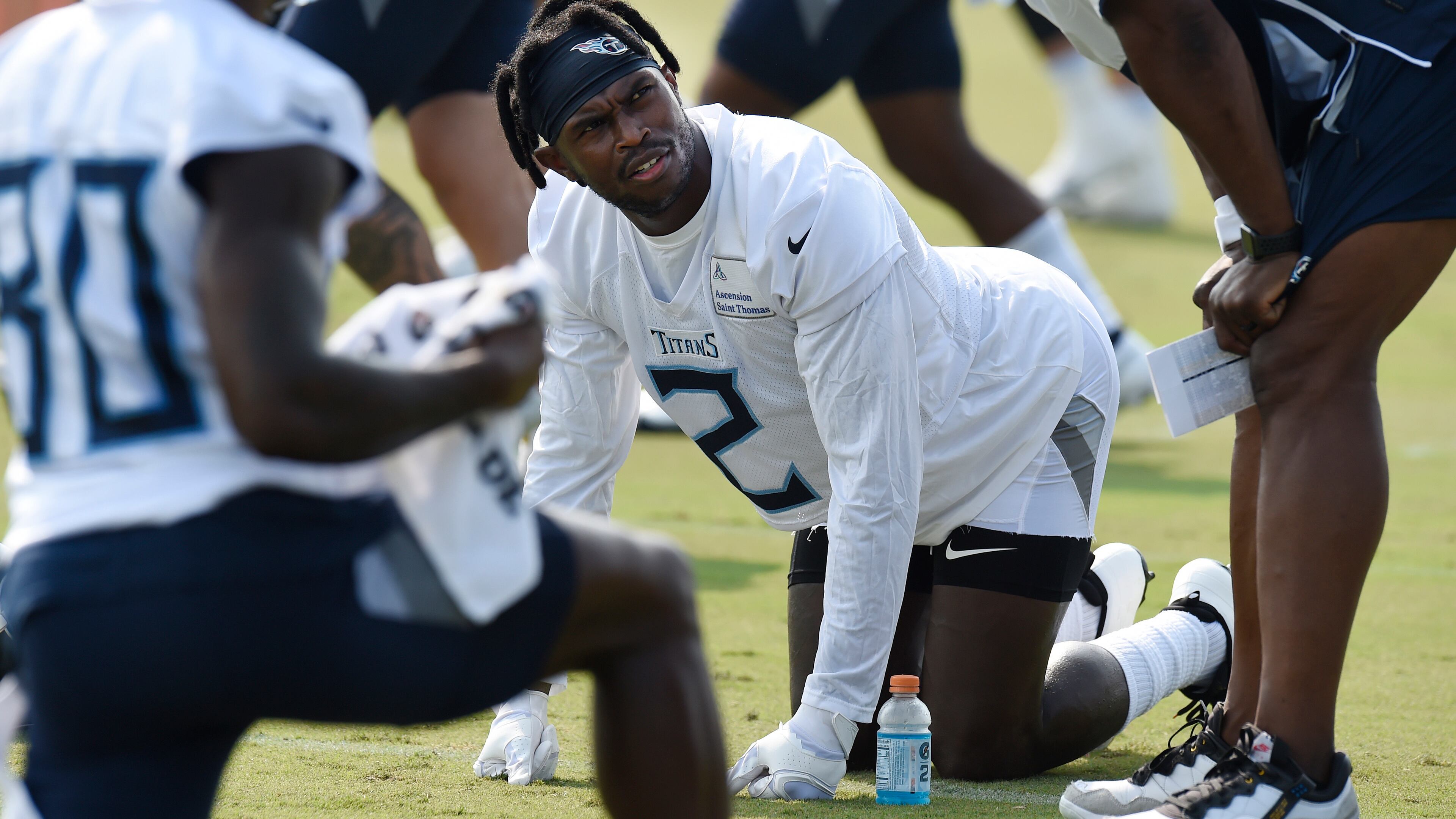 Tennessee Titans wide receiver Julio Jones (2) stretches a during training camp practice Saturday, July 31, 2021, in Nashville, Tenn. (Mark Zaleski/AP)