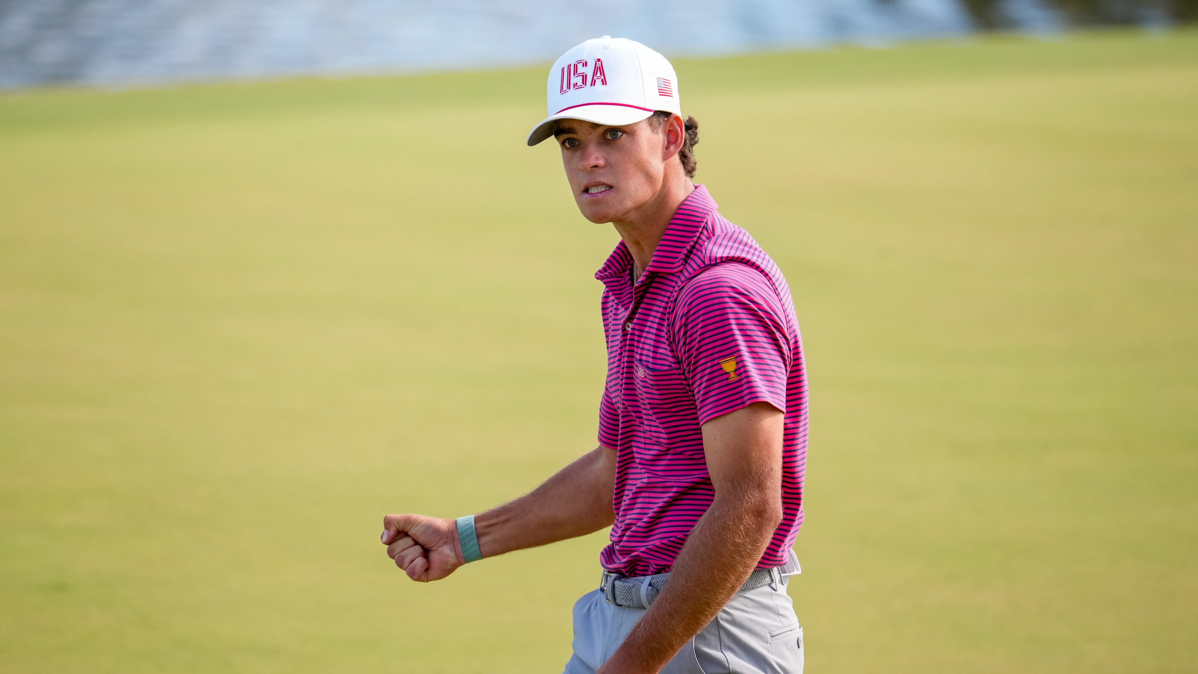 USA teams' Jackson Koivun reacts to his birdie putt on the 12th hole against the International team during a Presidents Cup golf tournament final round singles match at Medinah Country Club, Sunday, Sept. 27, 2026, in Medinah, Ill. (AP Photo/Matt Slocum)