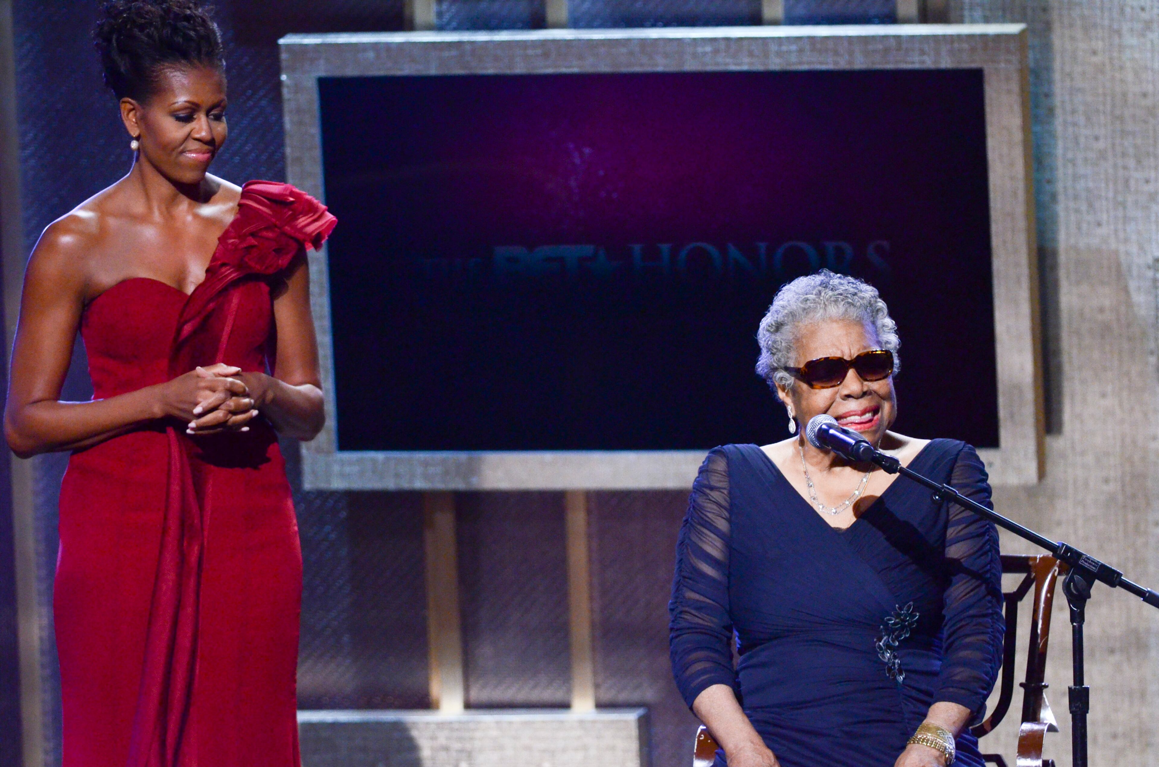 Michelle Obama and Maya Angelou speak during the BET Honors 2012 at the Warner Theatre on January 14, 2012 in Washington, DC. (Photo by Kris Connor/Getty Images)